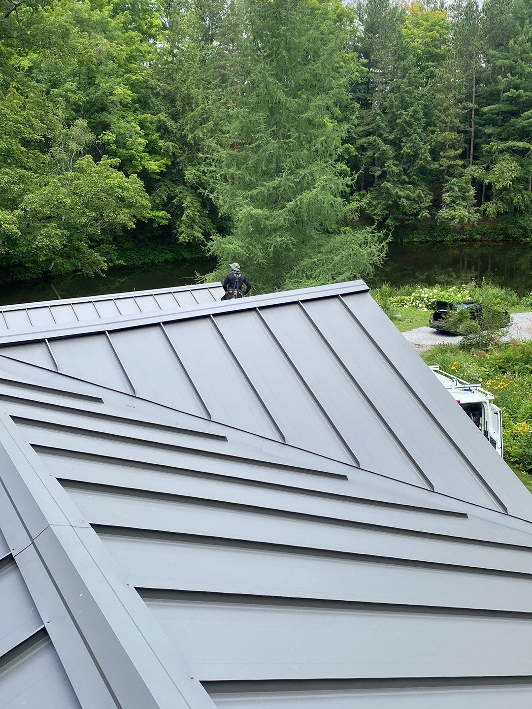 Residential Roofing Installation using 24 Ga Standing Seam Meta by Jay Carter Roofing & Sheet Metal