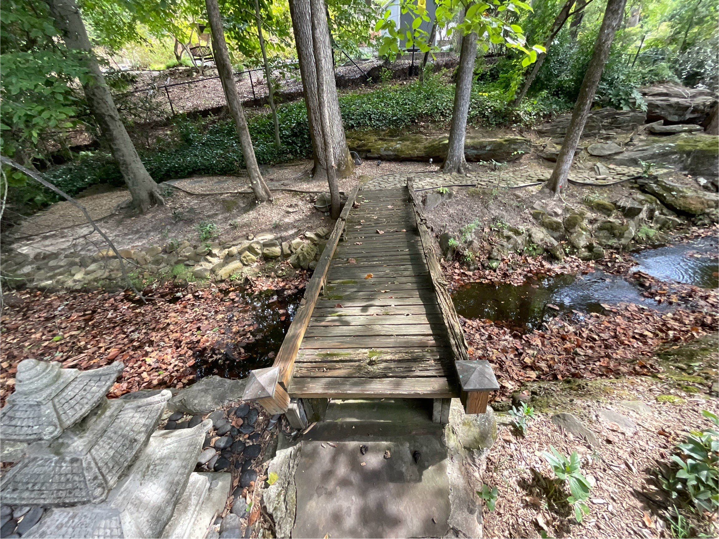 Pressure-Treated Wood Deck Replacement and Garden Bridge in Atlanta by Swift Home Renovations