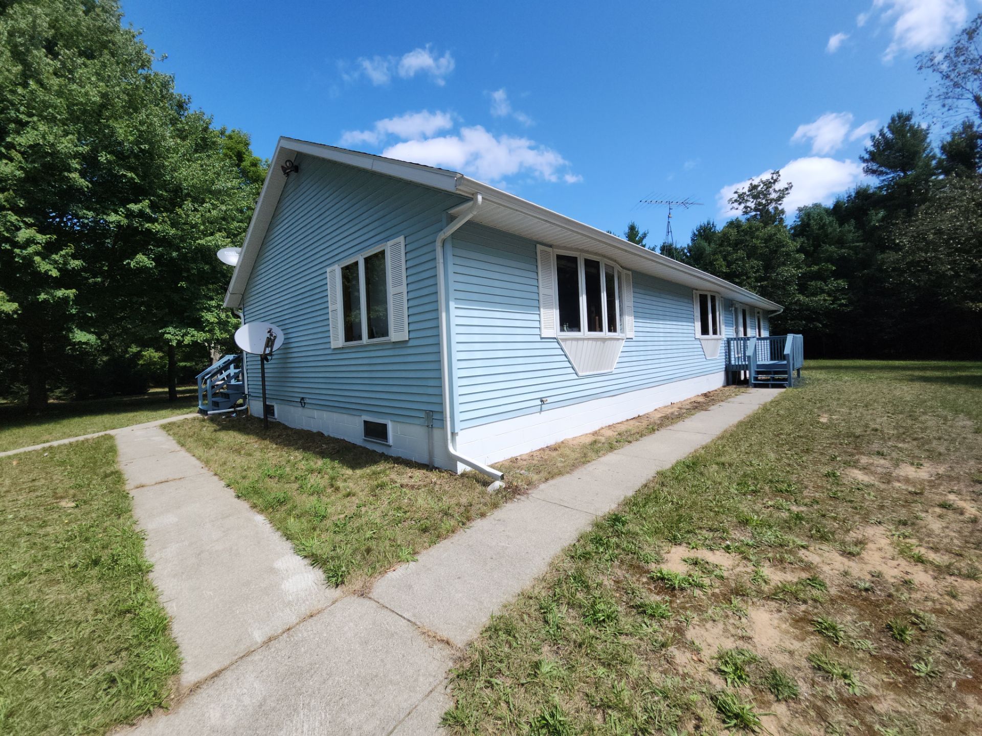 Deck staining and exterior foundation painting! by Gordon Painting