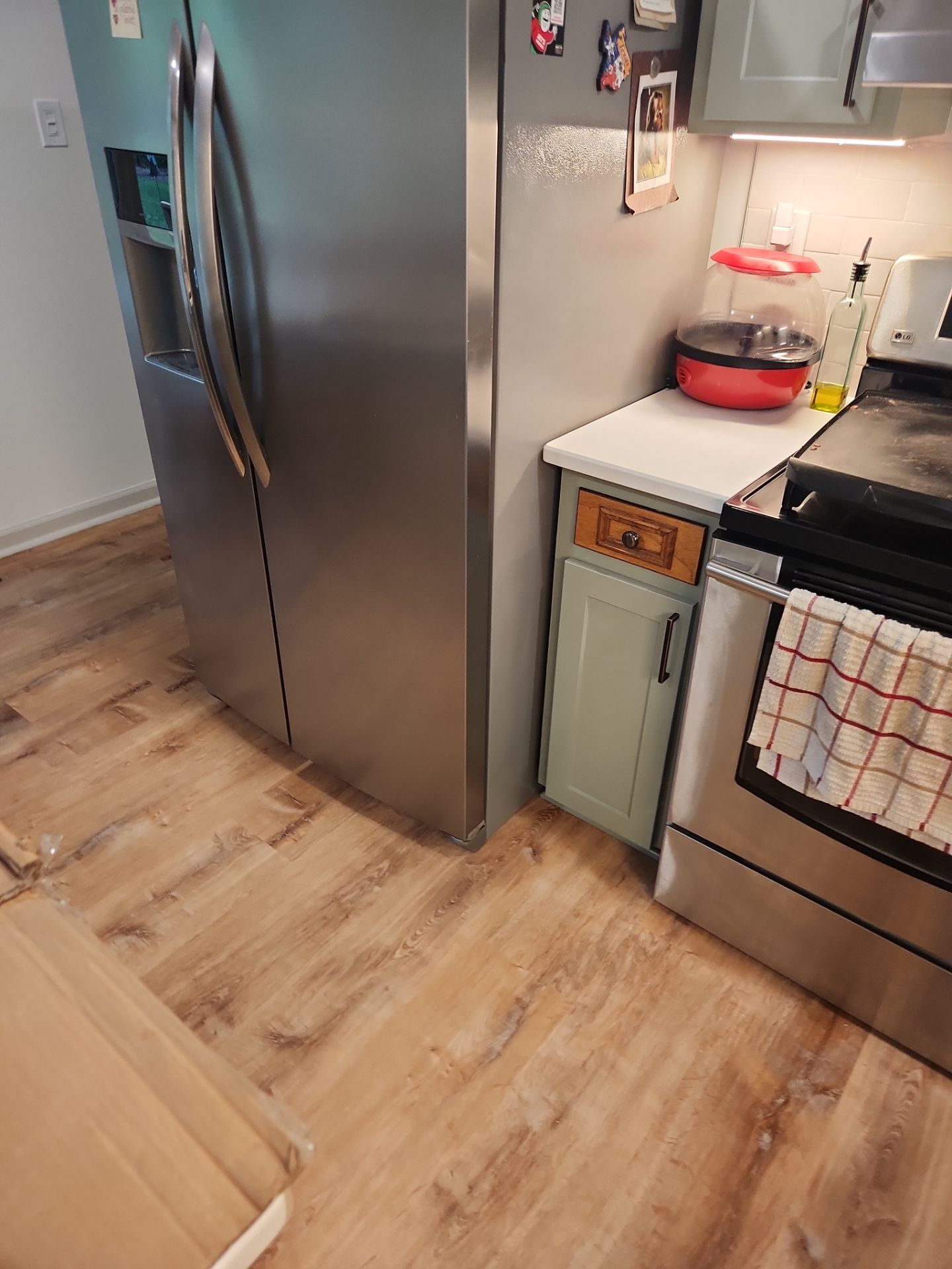 A Pathway to Personality – A Two-Tone Kitchen Transformation in Apex by Elite Remodeling and Design LLC
