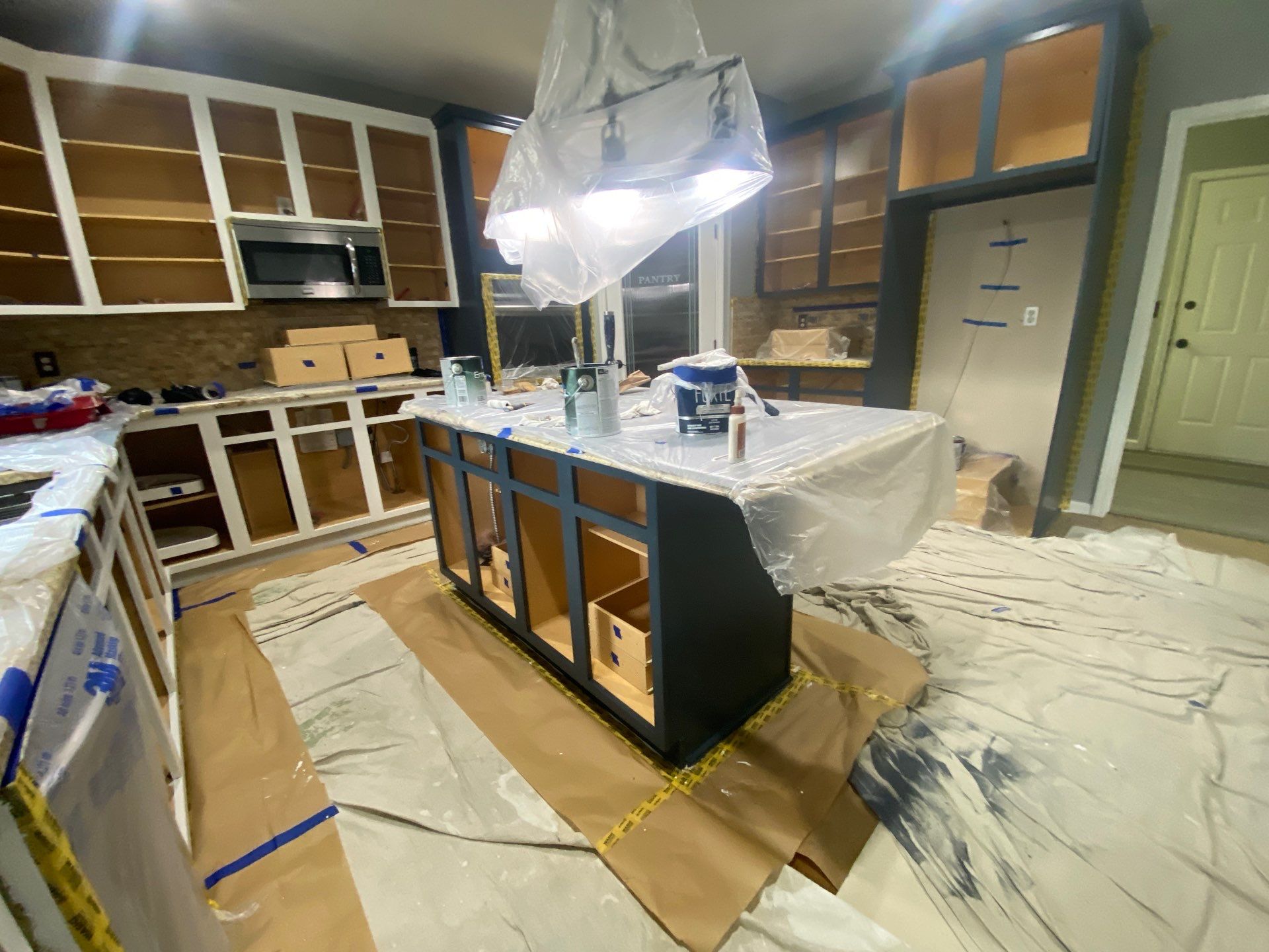 Kitchen Cabinet Refinishing by Top Shelf Painter