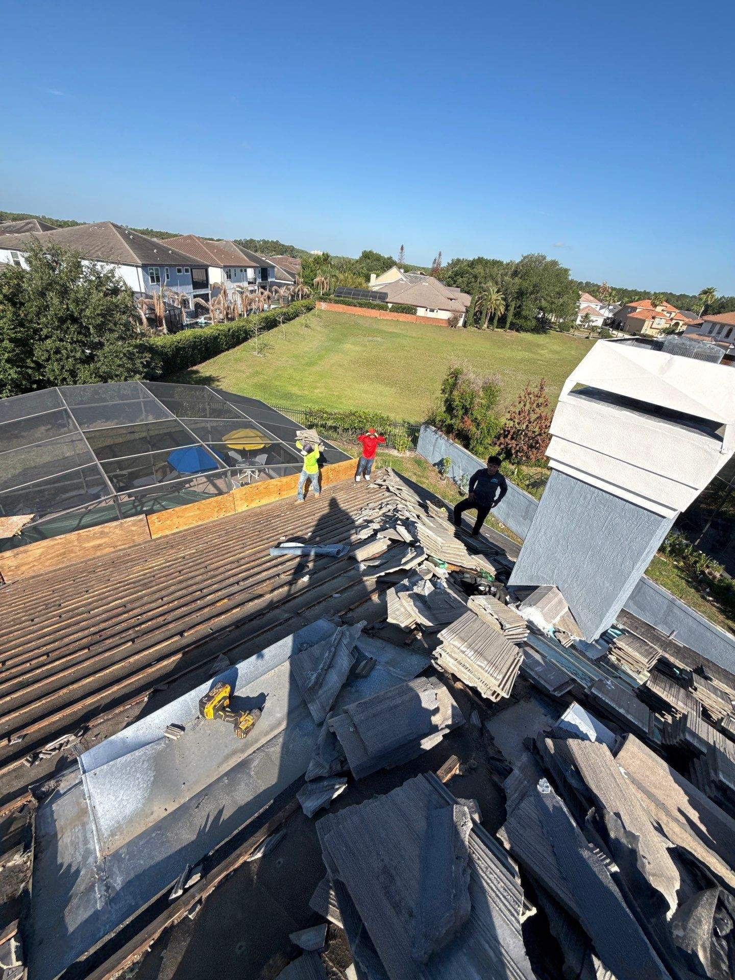 Winter Park Concrete Tile Roof Replacement and Chimney Flashing Installation by Fortified Roofing Solutions Corp.