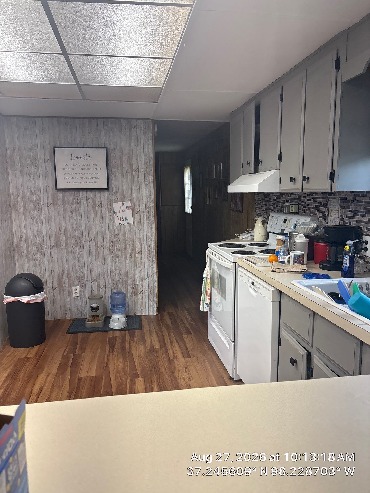 Kitchen Remodel Featuring Gray Cabinetry and Wood-Look Flooring by CompanyCam Sales Demo