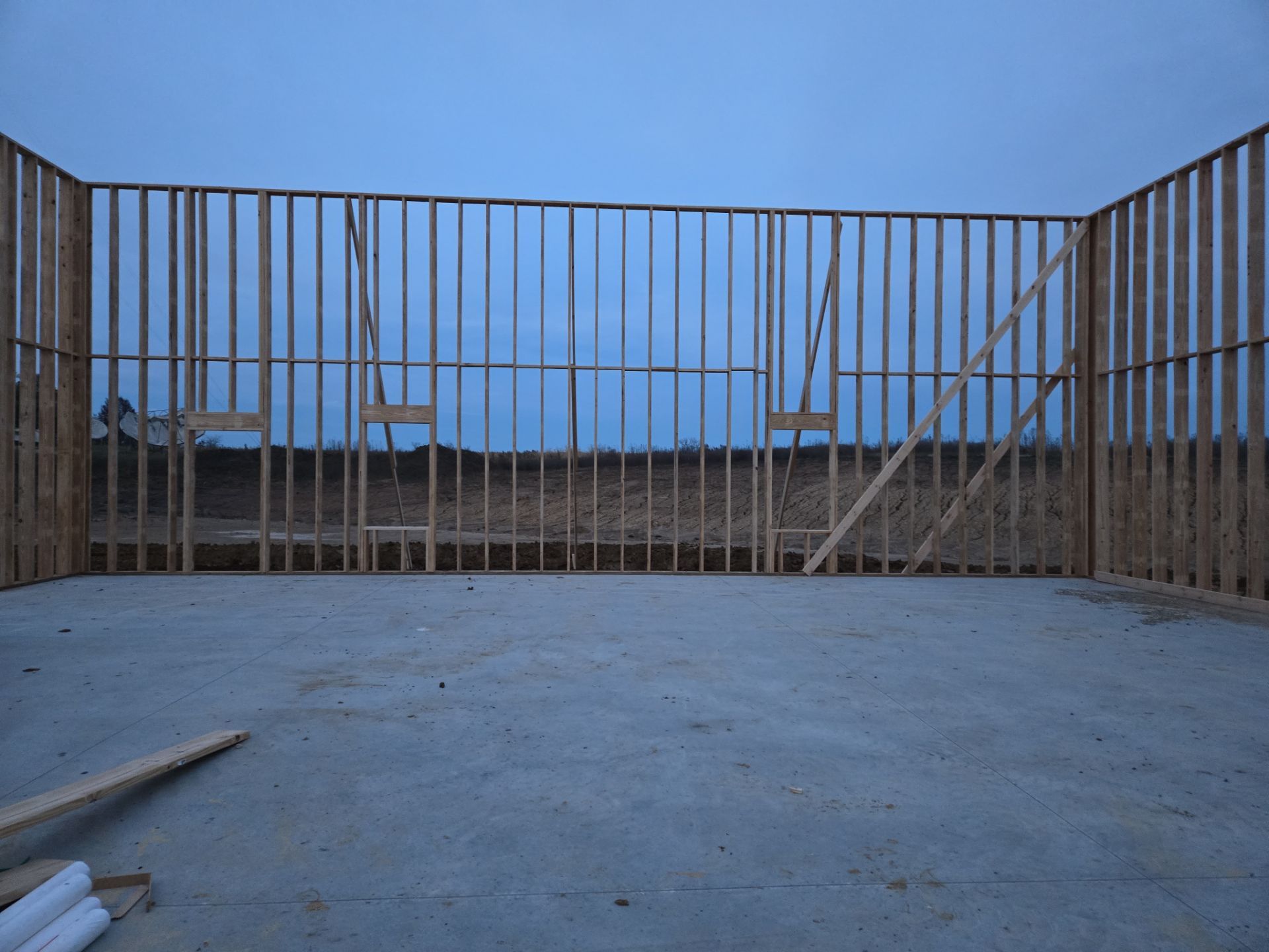 New Home construction w/ board and batten sides and metal roof  by Miles Construction 