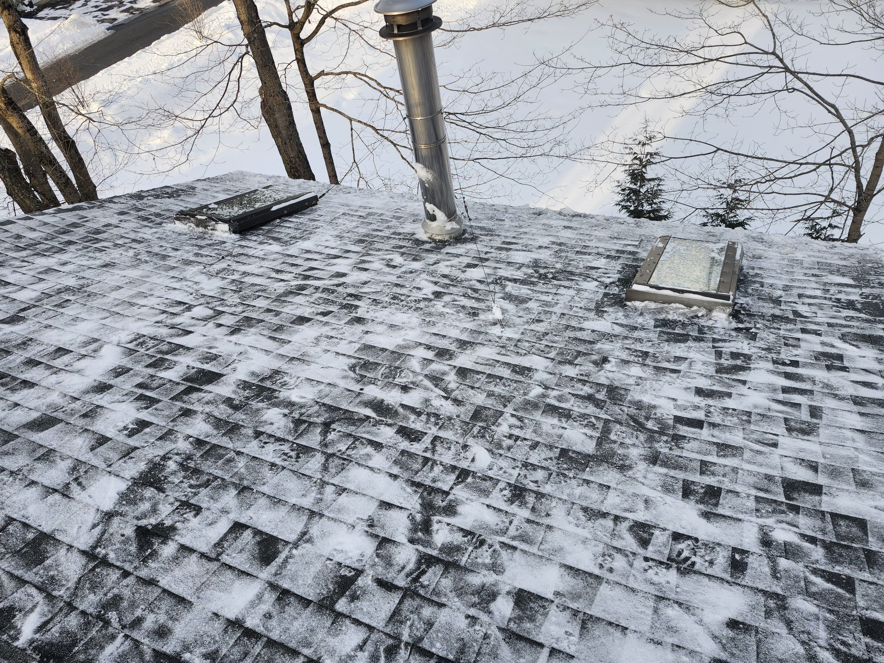 Ice Dam and snow removal by Mighty Dog Roofing of Greater Middlesex County