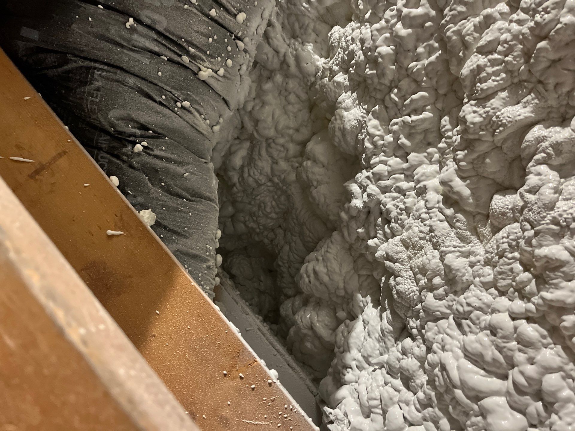 Attic Insulation using open cell spray foam by NYS Foam & Energy
