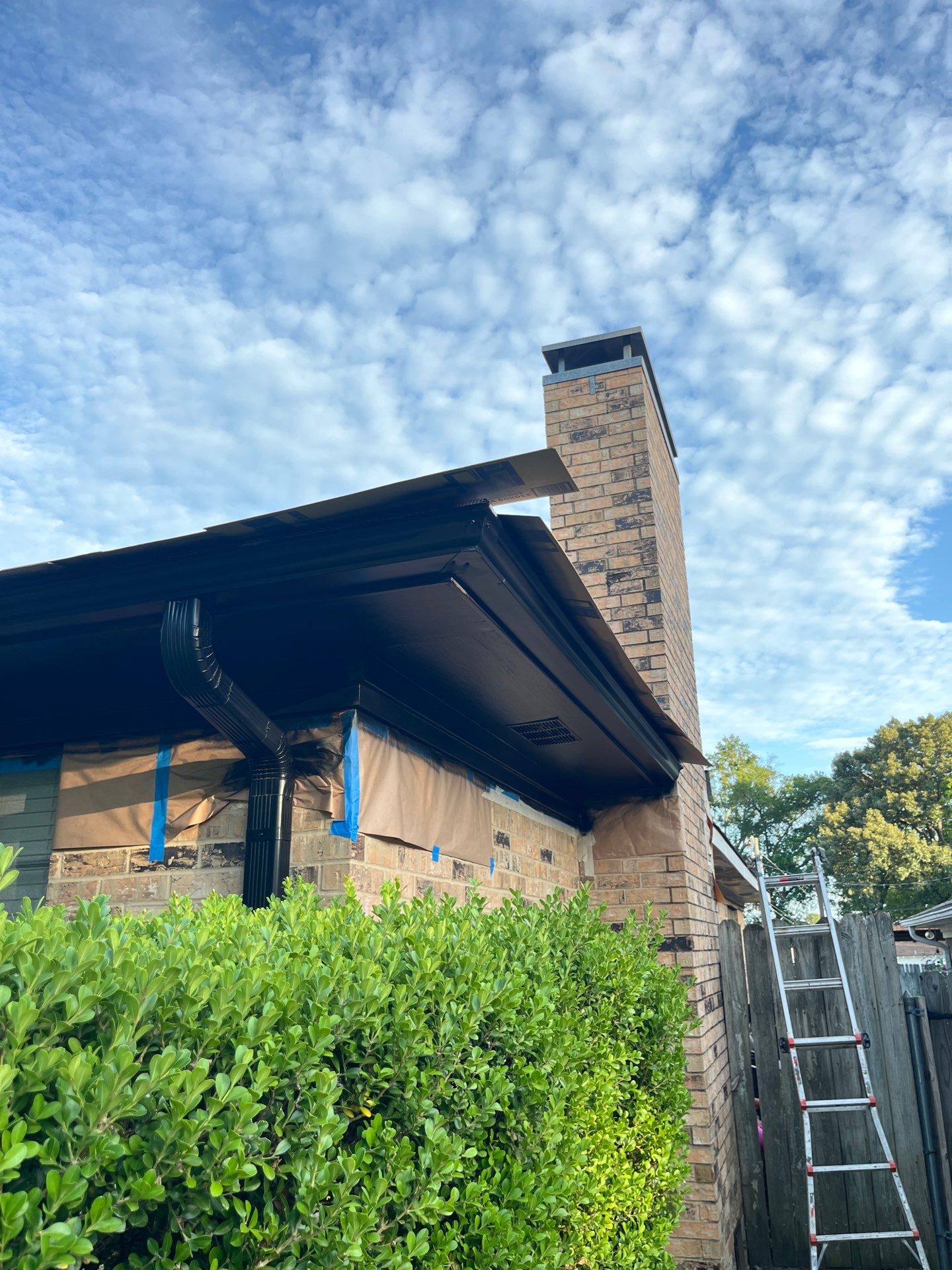 Exterior Painting in Tyler, TX | Eaves, Door & Columns in Elegant Black by Quality Coats Painting