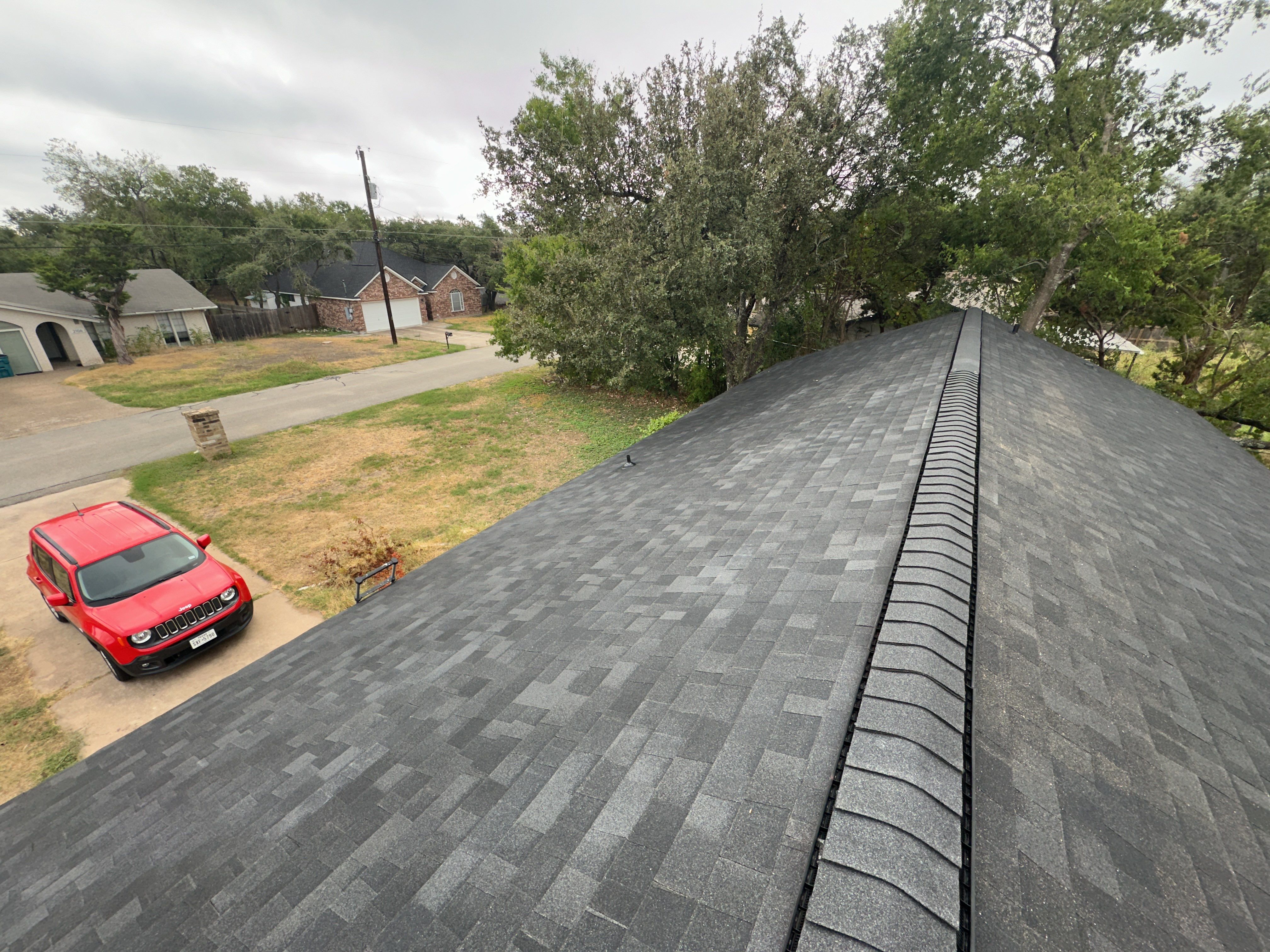 Charcoal Shingle Roof Replacement in Cedar Park by Skywall Construction LLC
