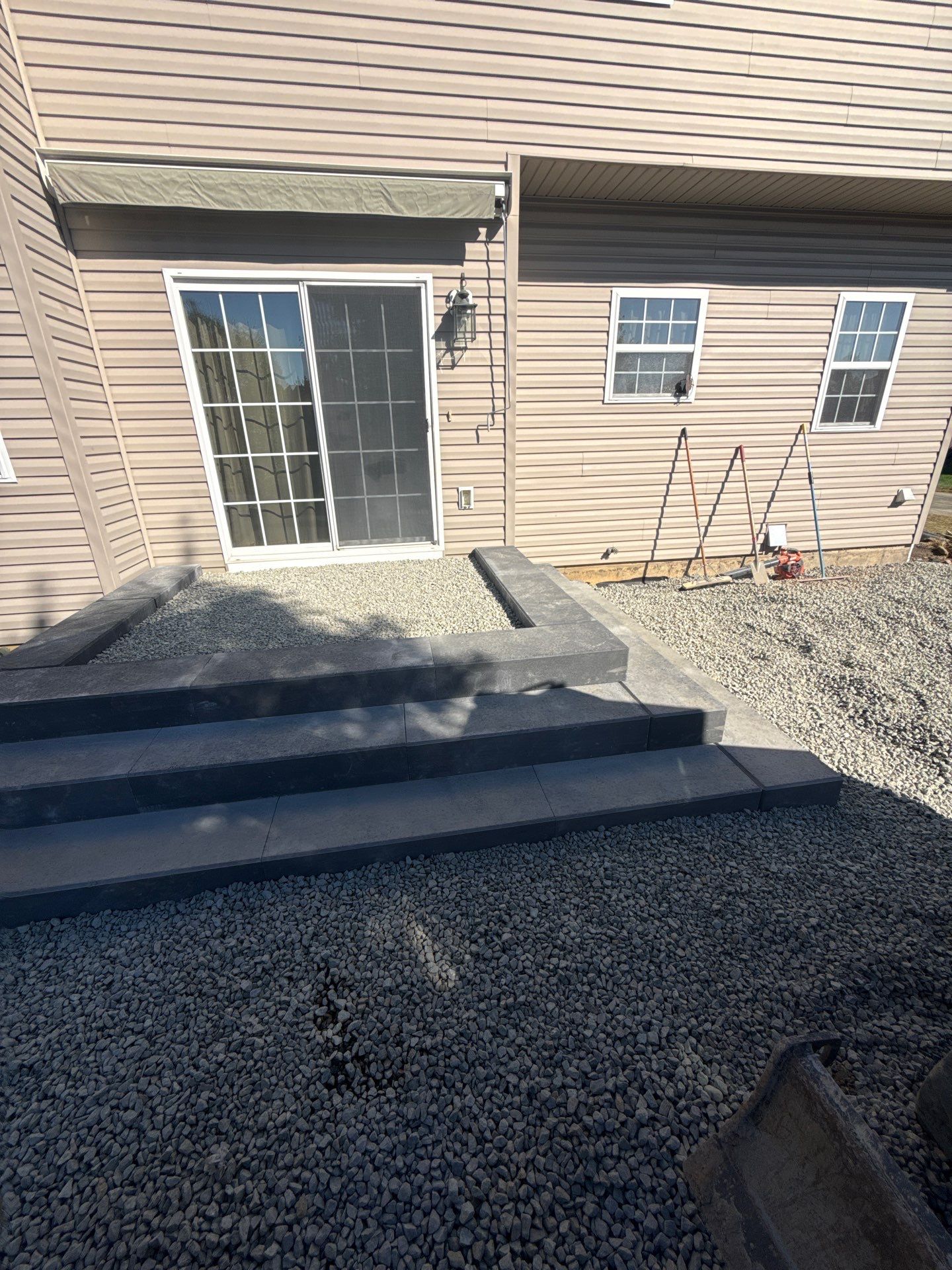 Backyard Retreat: Techo-Bloc Patio + Firepit Lounge by Saylor’s Lawn & Landscape