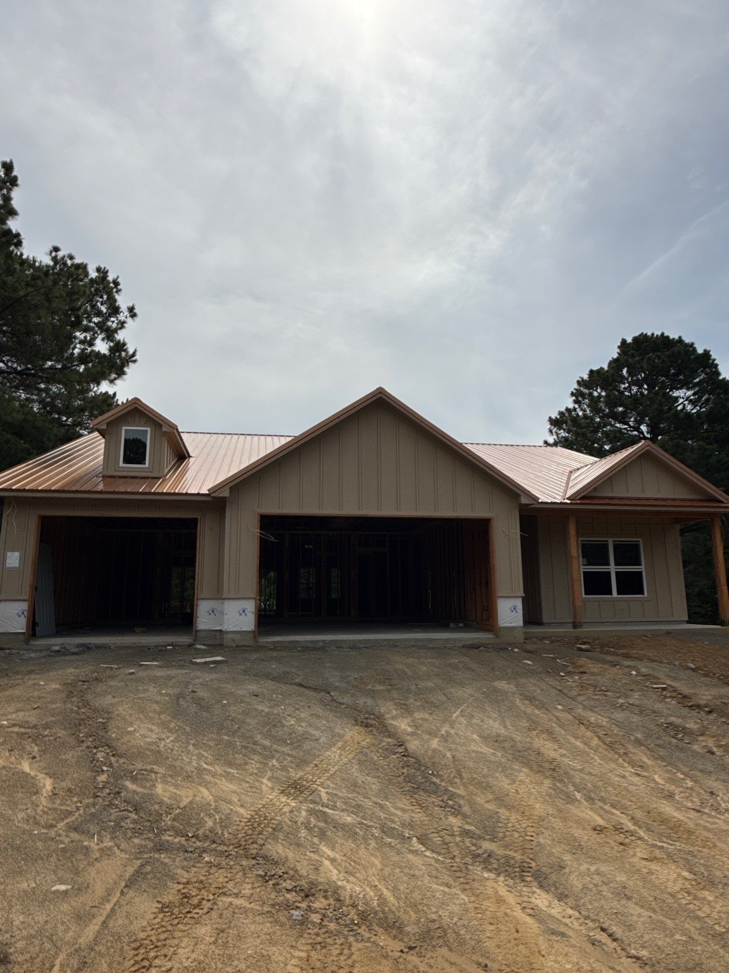 Copper Metallic 26-gauge low rib metal roofing. by In & Out Construction & Remodeling, LLC