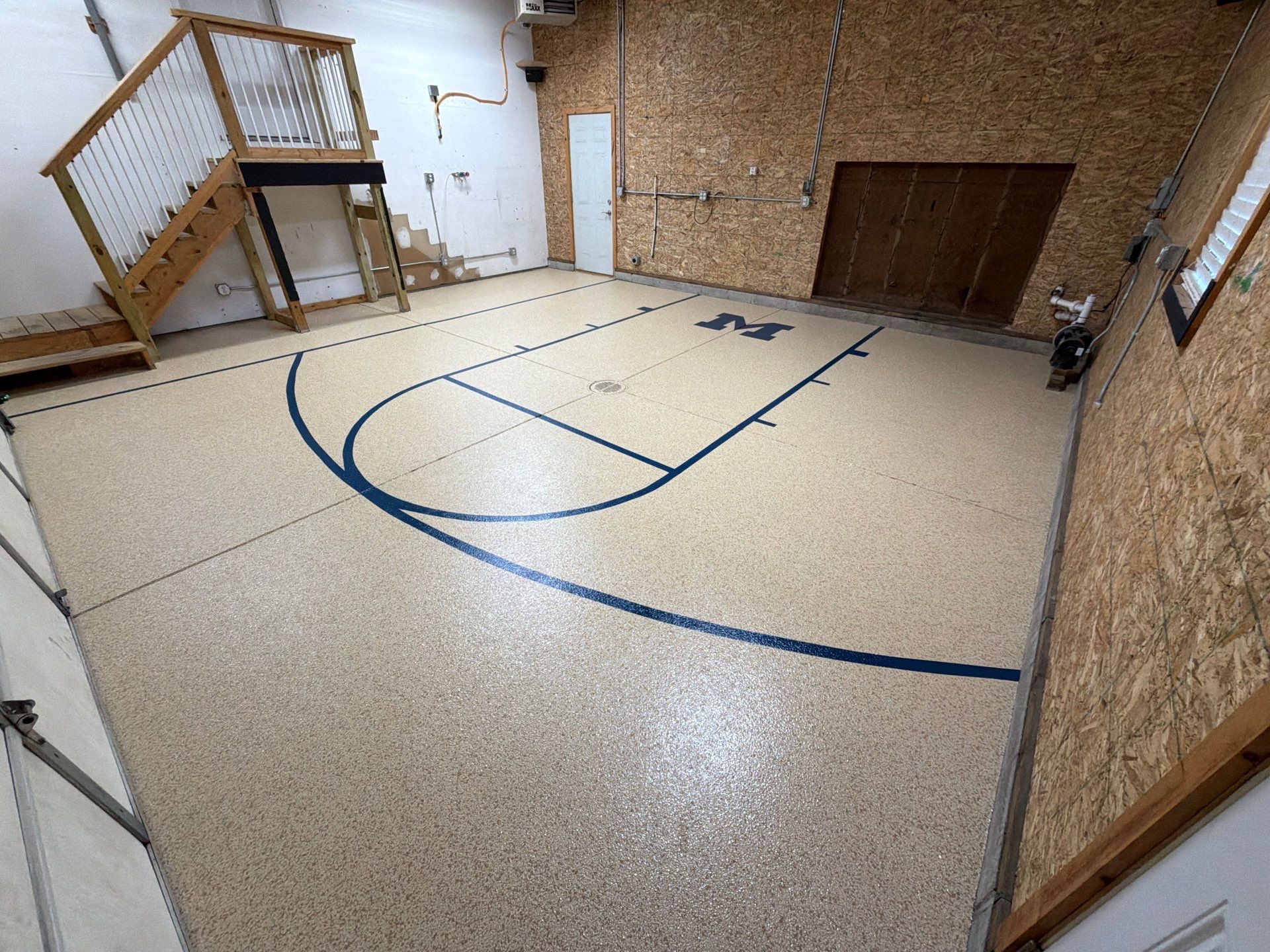 Custom Epoxy Garage Floor Completed In Norton Shores Michigan by Gordon Painting