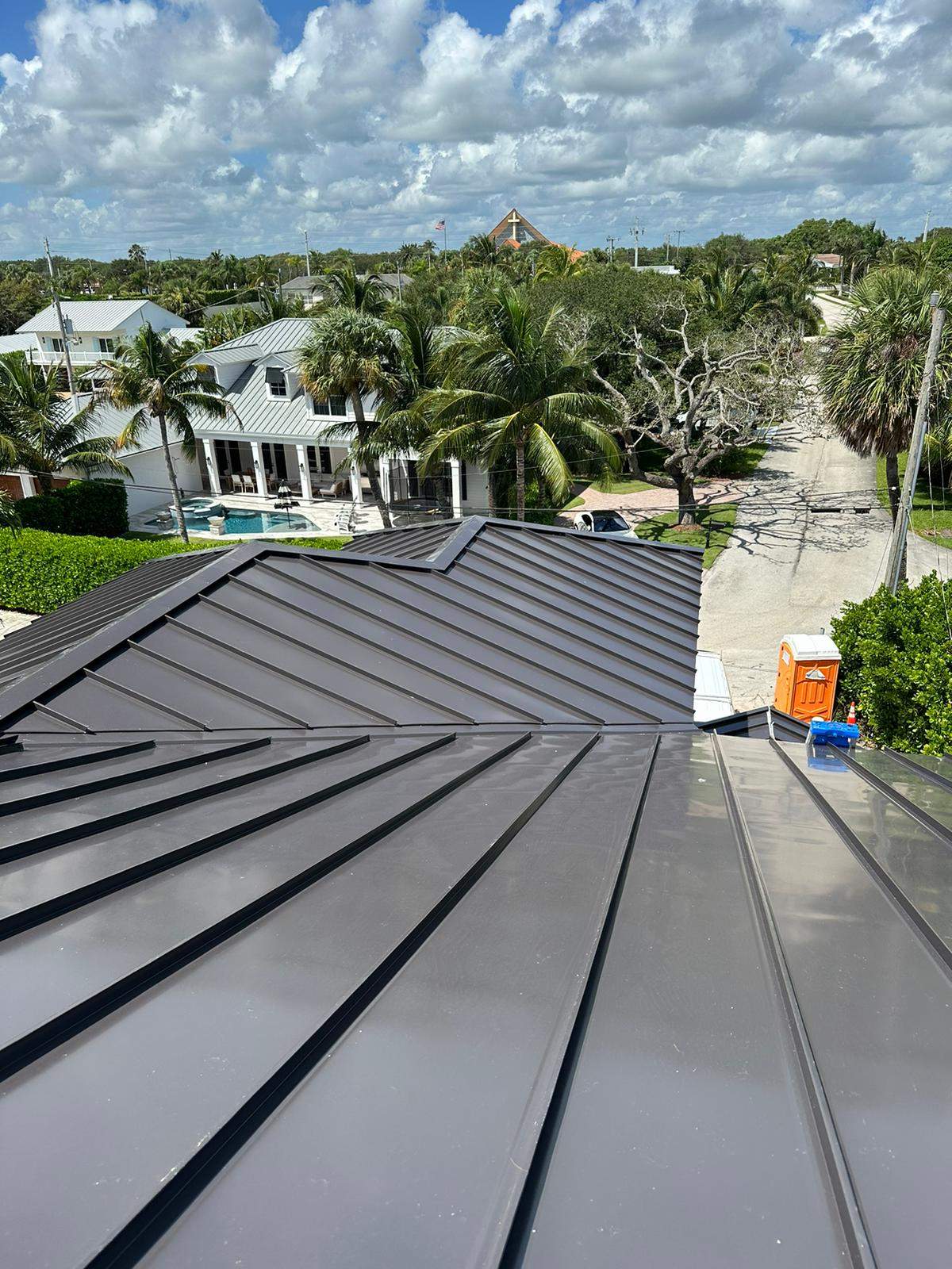 .040 Aluminum 1.5" Mechanical Seam Dark Bronze  by Total Roofing System The Metal Roof Experts