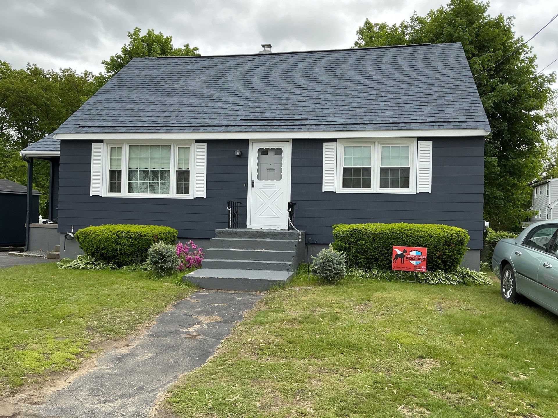 Roof and Flat Roof Membrane Replacement in Lowell, MA by Mighty Dog Roofing of Greater Middlesex County