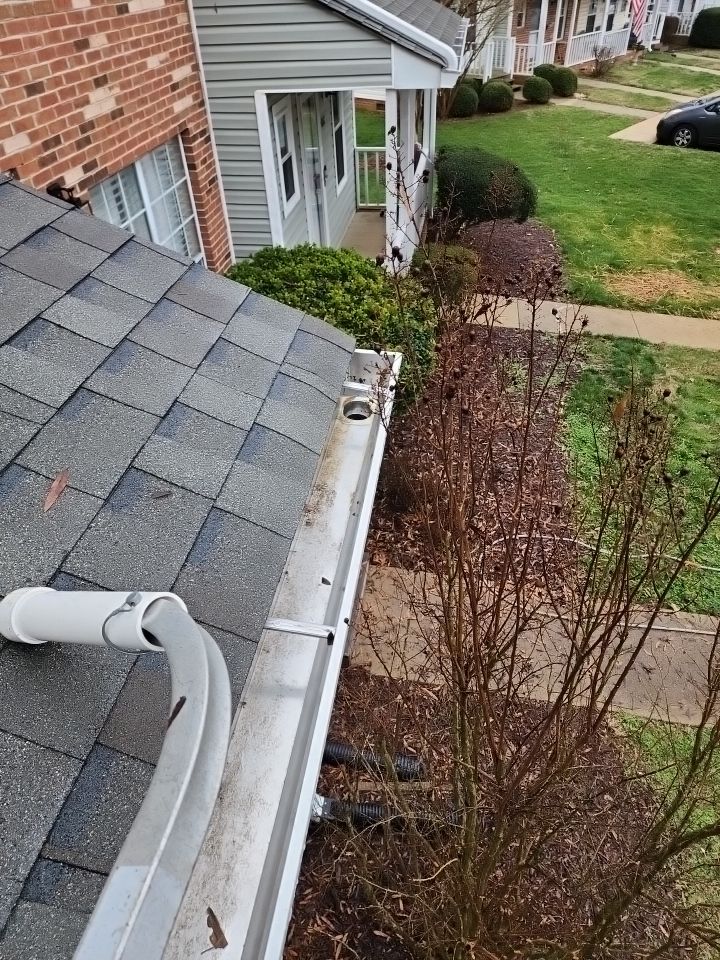 Gutter Cleaning using water by Power Wash Masters LLC