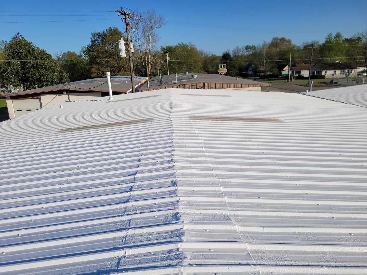 Commercial Metal Restoration System using Aldocoat Coatings by Hostetler Roofing