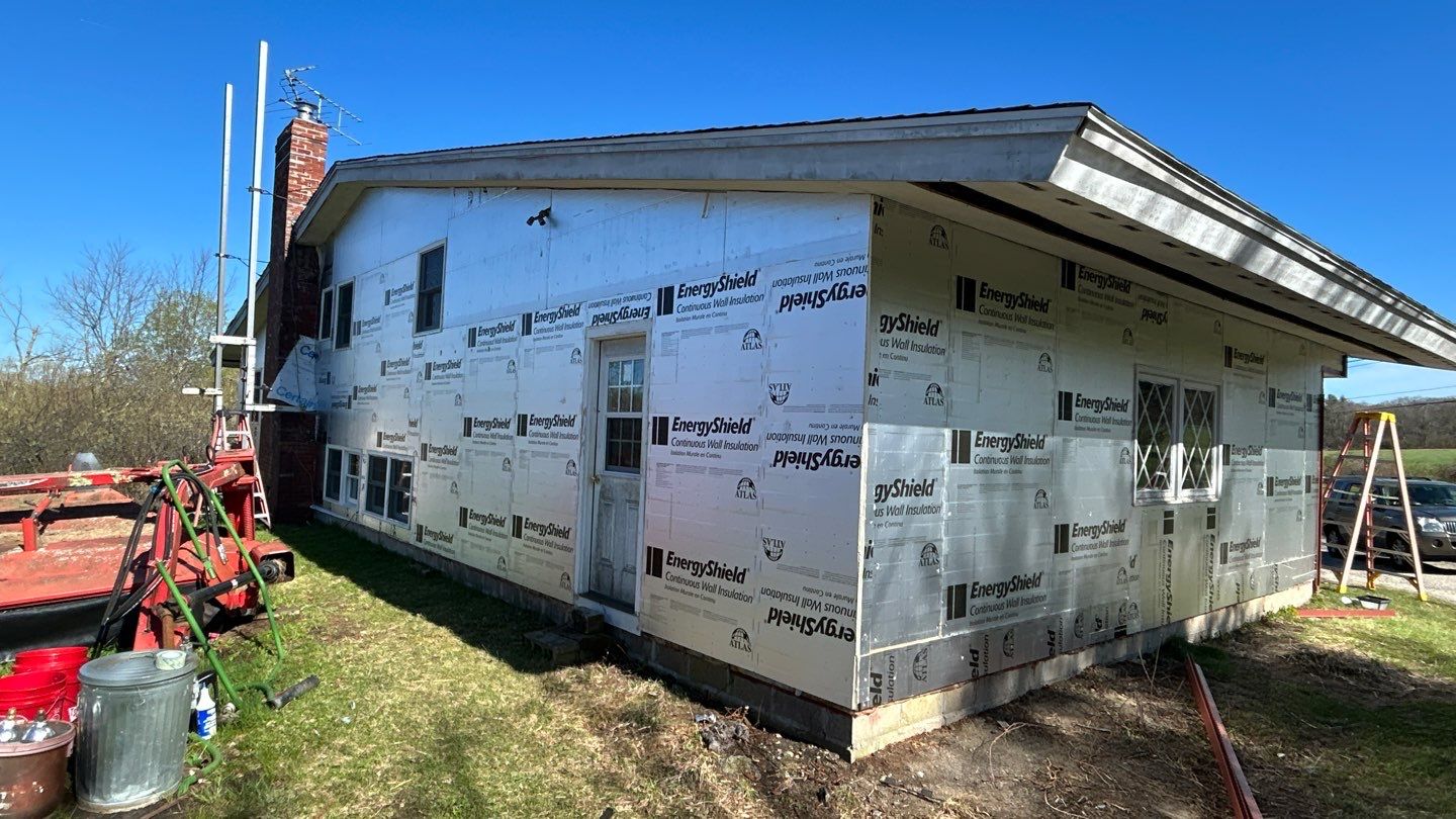 Siding Refresh with Cert S/7 Reverse Board & Batten, Autumn Red by DiGiorgi Roofing and Siding Inc