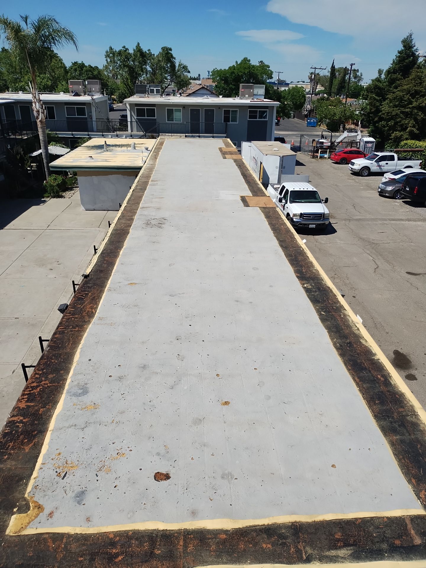 Foam Refurbish using General Coatings acrylic coatings and spray foam by Straight Edge Roofing Inc