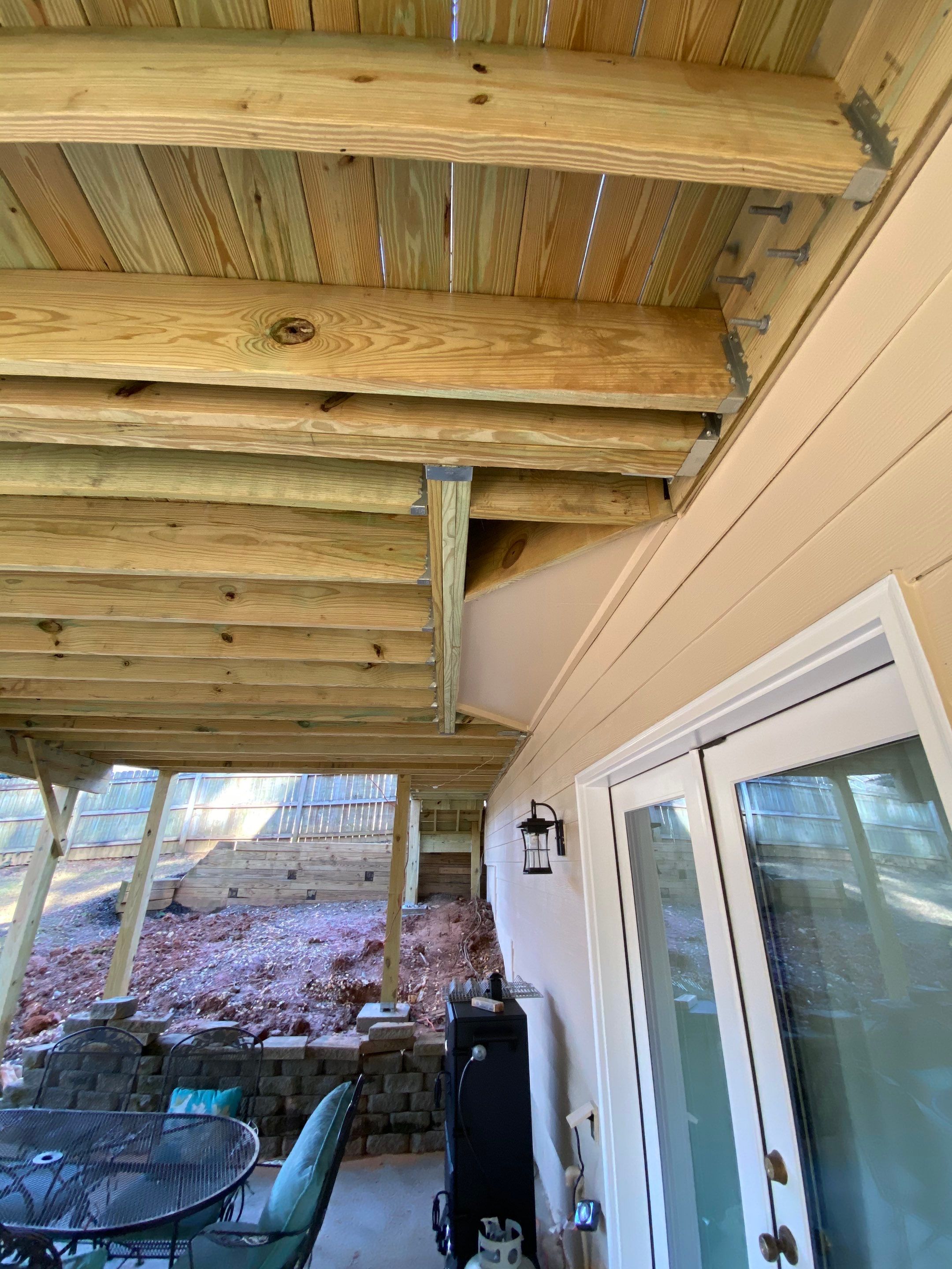 Elevated Pressure-Treated Wood Deck Replacement and Staircase in Duluth by Swift Home Renovations