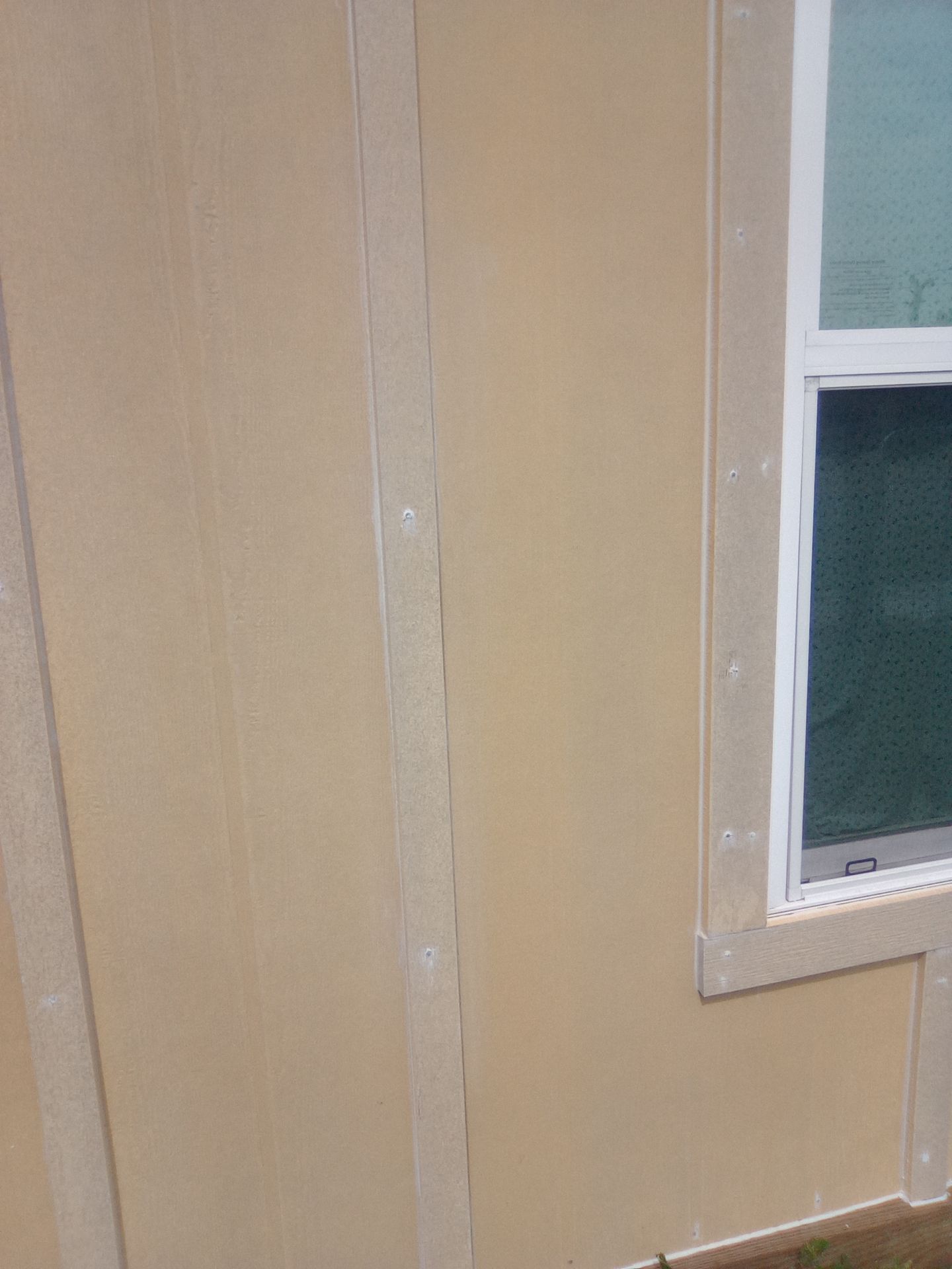Vinyl to Hardie by Bayfront Roofing and Construction