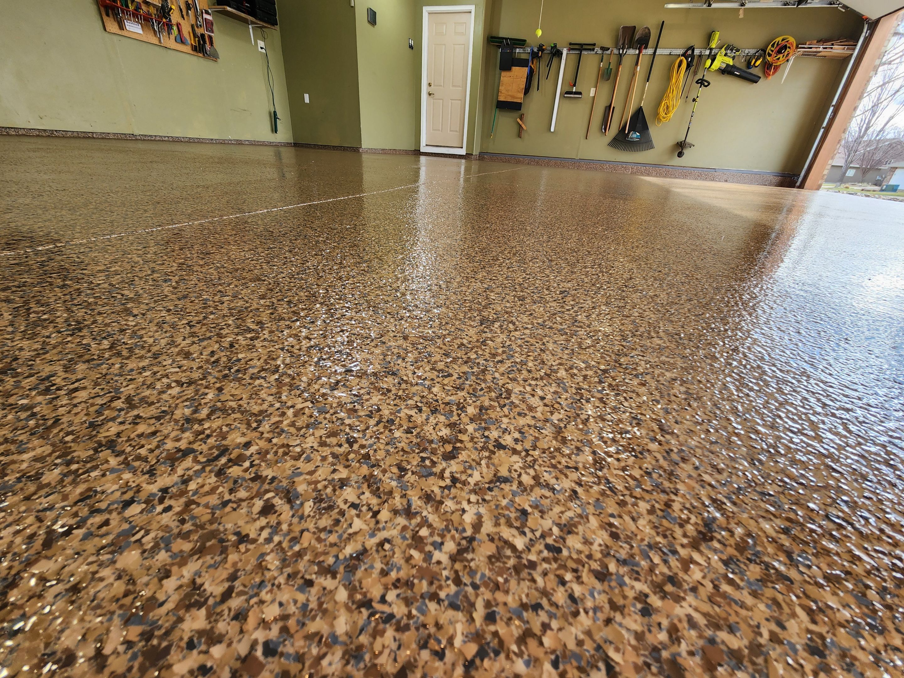 Sioux Falls Garage Floor Concrete Coating with Textured Aggregate by Select Painting, Coatings & Garage Cabinets