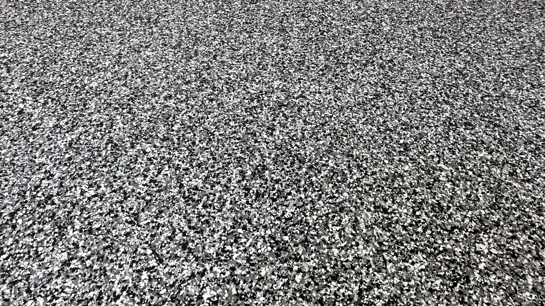 Jim E. went with a beautiful Banner Flake floor  by Banner Garage