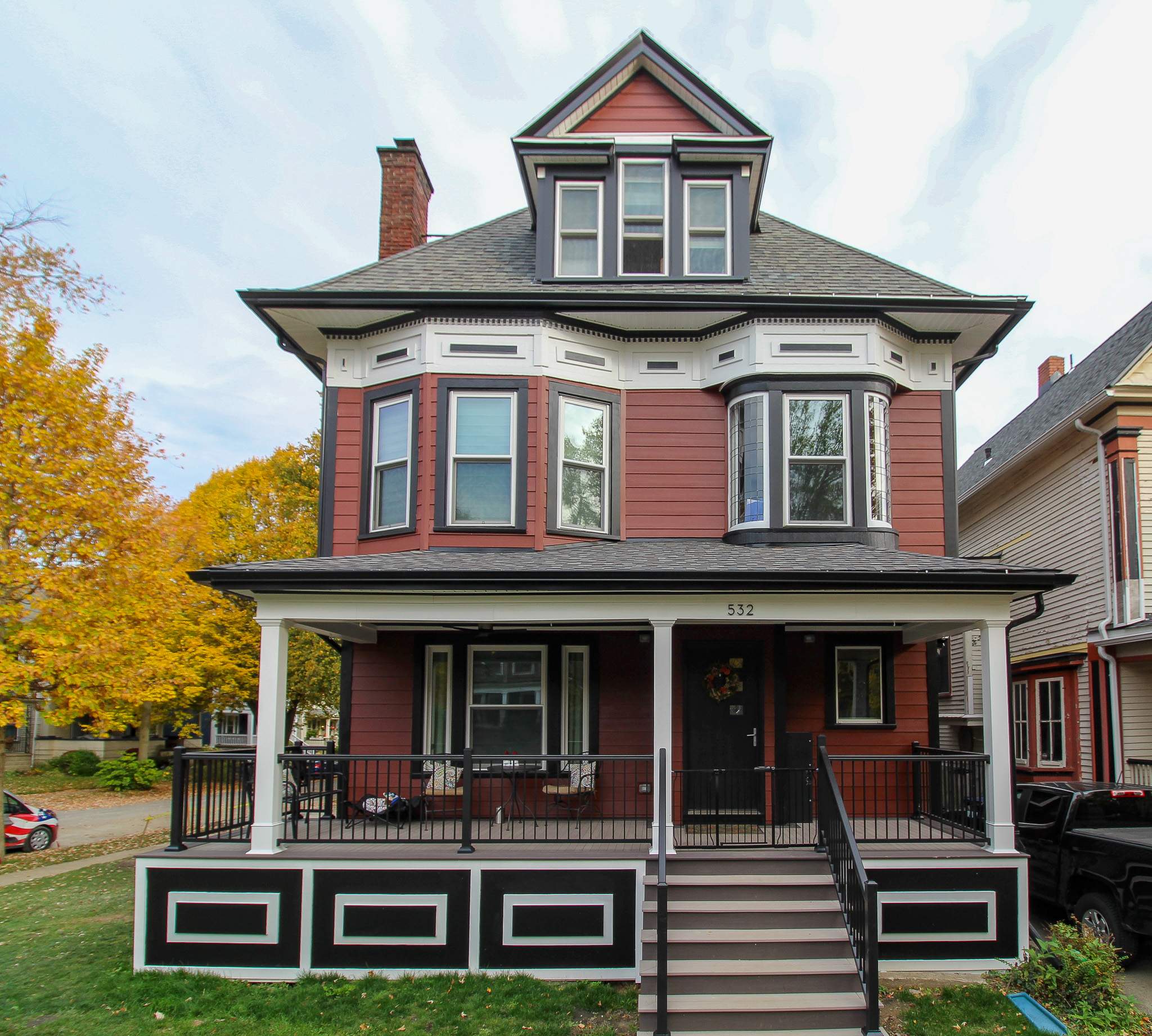 Exterior Renovations- Siding, Stamped Concrete, Porch, and Railings by Ivy Lea Construction