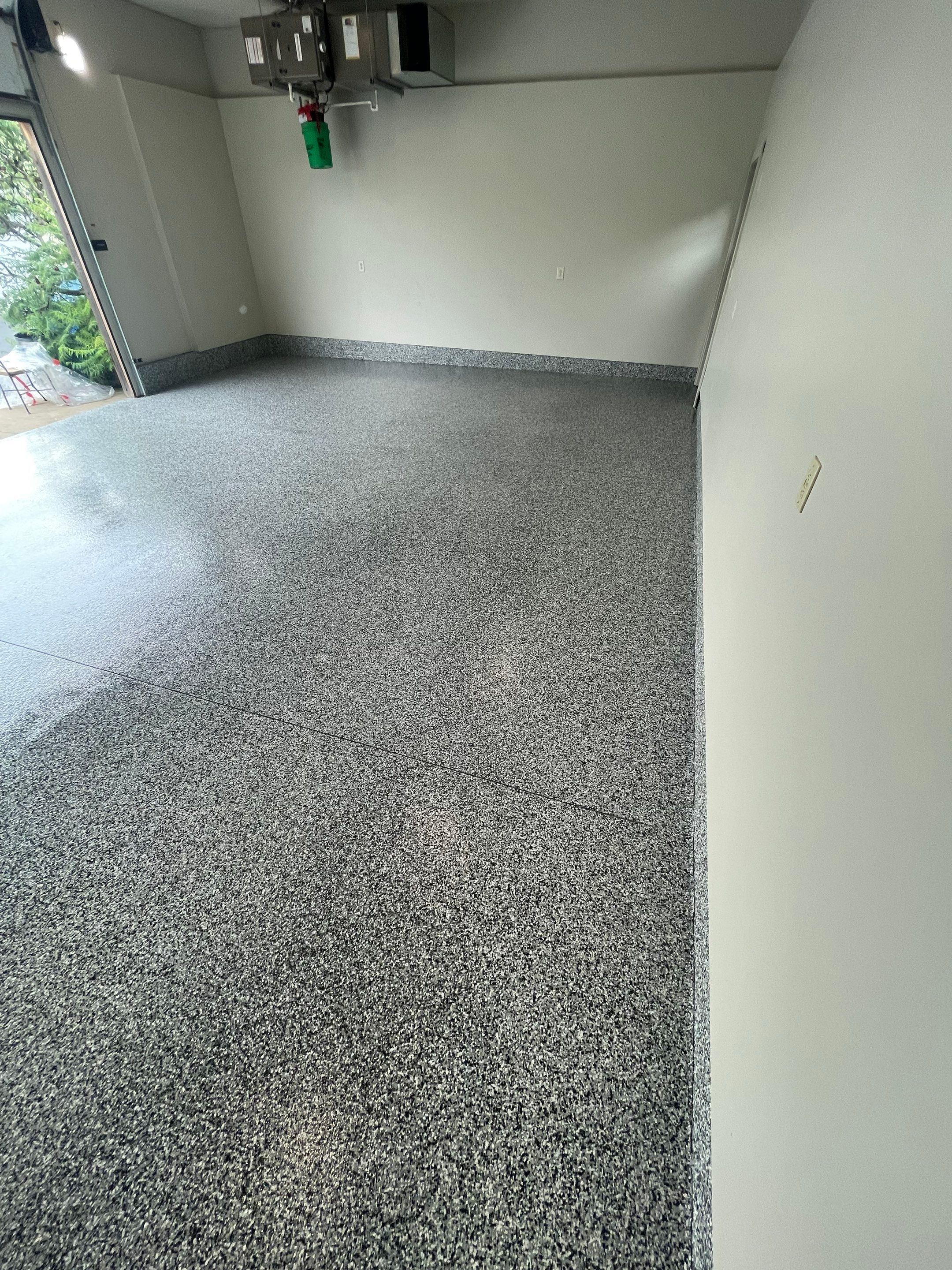 Domino Flake Floor Coating and Crack Repair in Chancellor by Select Painting, Coatings & Garage Cabinets