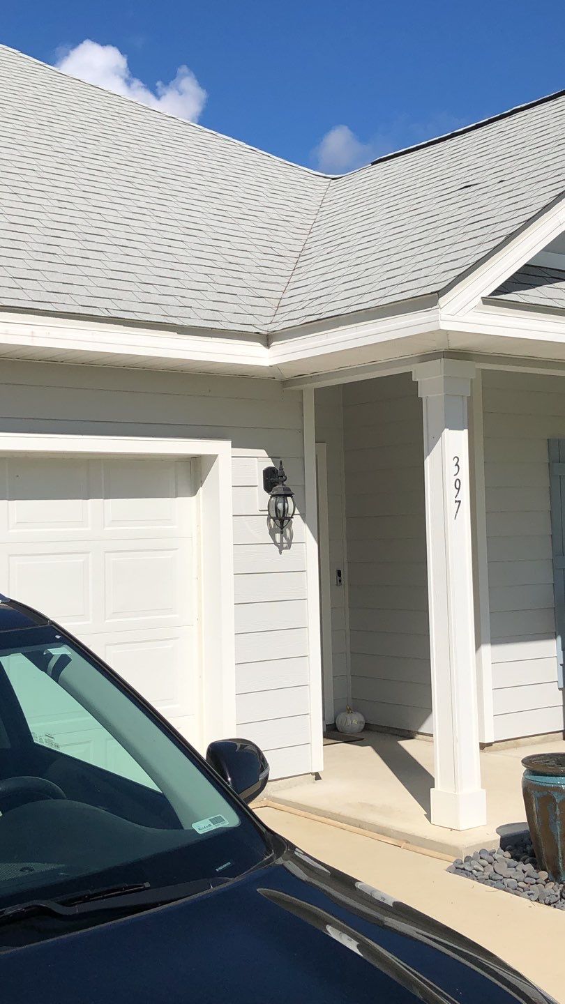 Seamless Gutter Installation using White by Gutter Professors