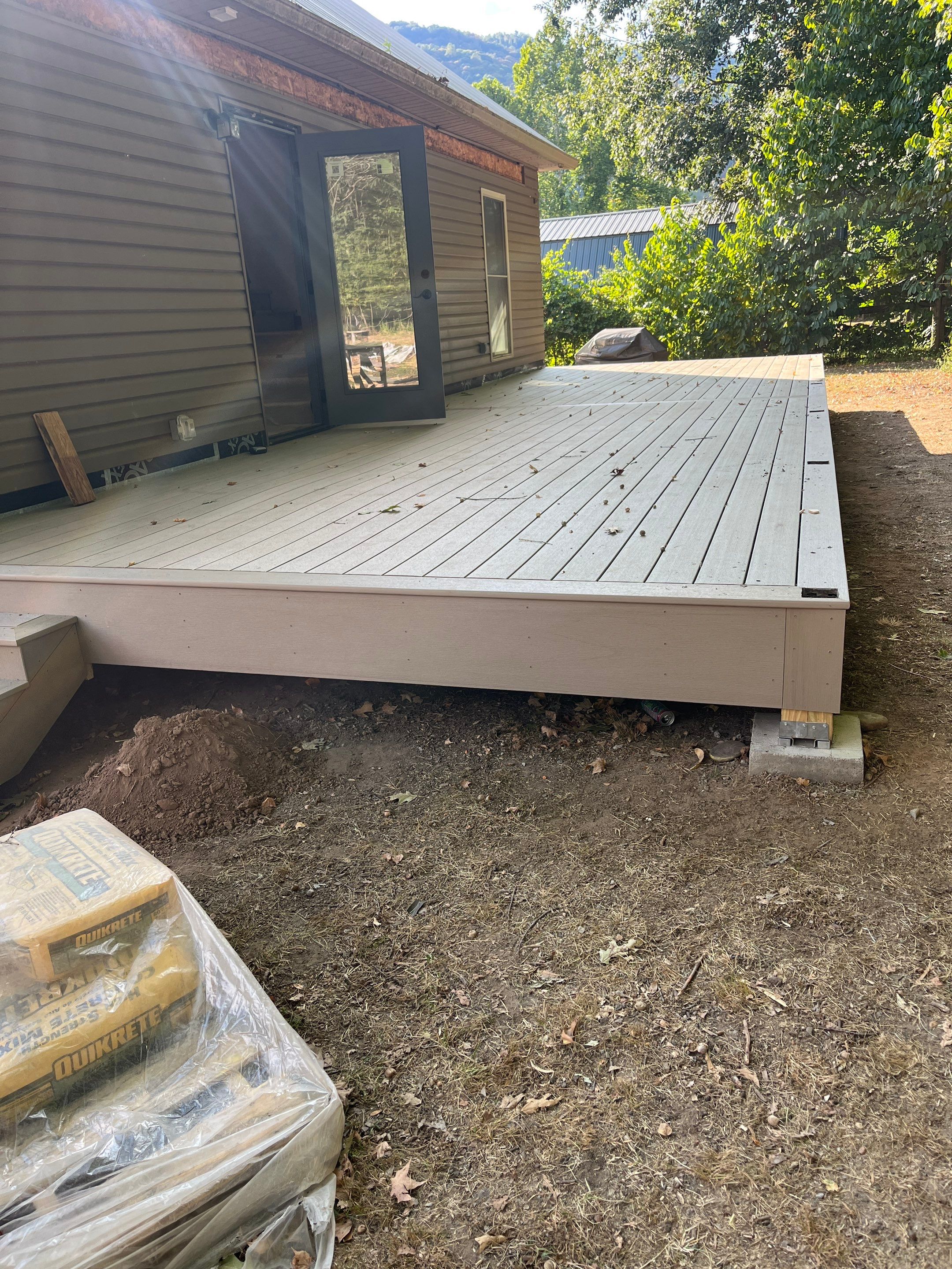 Custom Composite Deck and Screened Porch Addition in Hinton by Walnut Hollow Decks & Outdoor Living