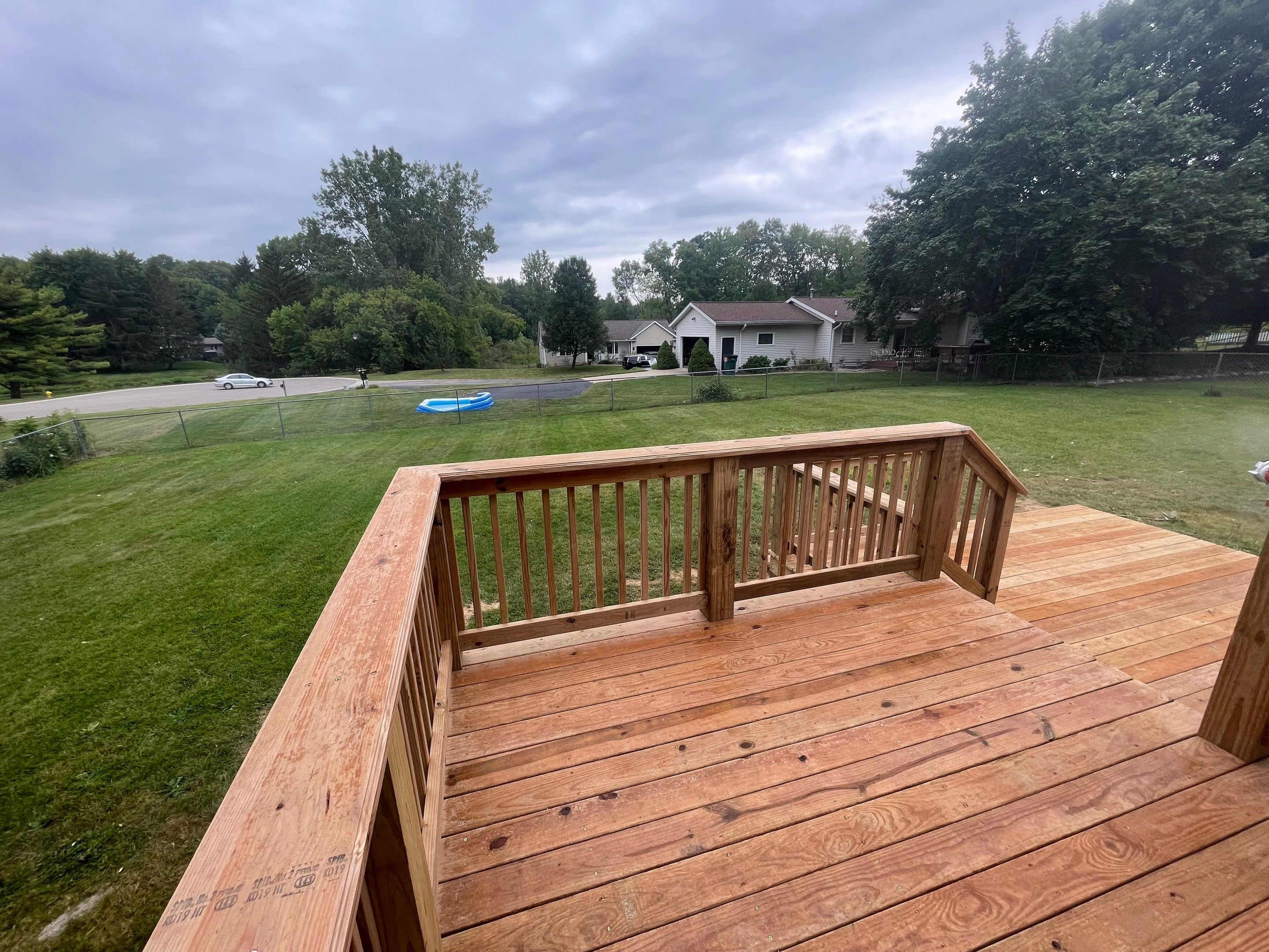 Deck Installation using Treated Lumber by Avalon Roofing and Exteriors