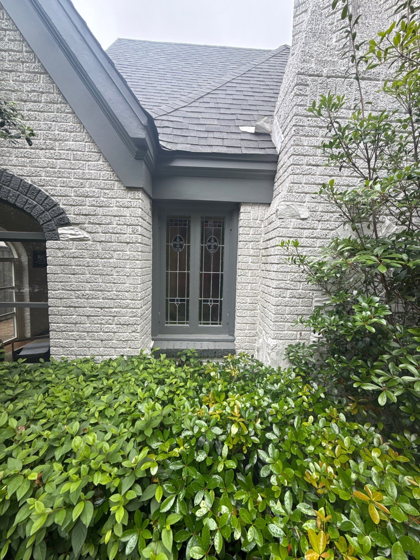 Residential Gutter Installation and Exterior Maintenance for Dallas White Brick Home by First Out Roofing 