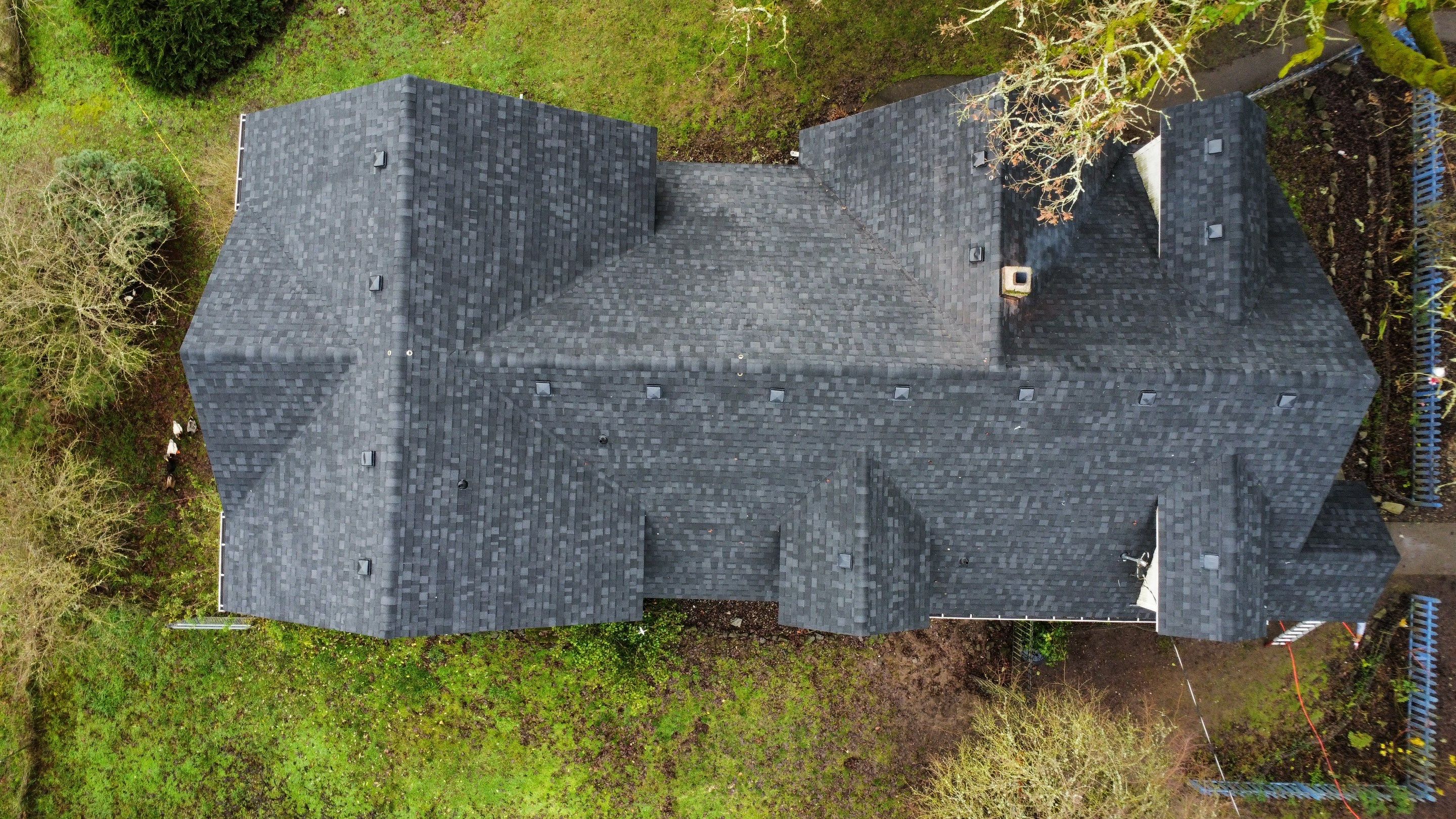 Residential Roofing Installation using IKO Dynasty (Color: Granite Black) by Orezona Building & Roofing Company, Inc.