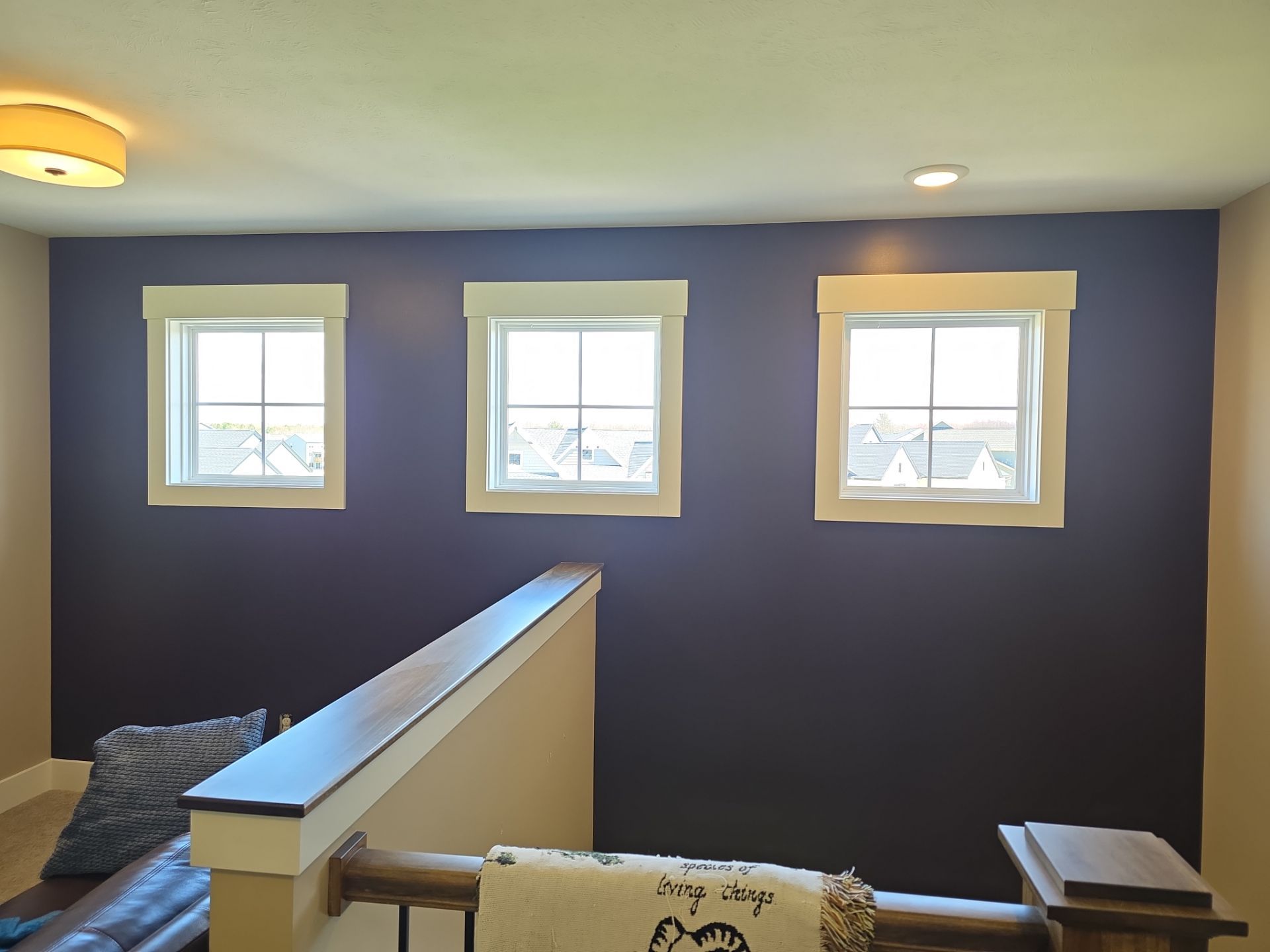 Interior Painting and Two-Story Accent Wall Transformation in Grand Haven by Gordon Painting