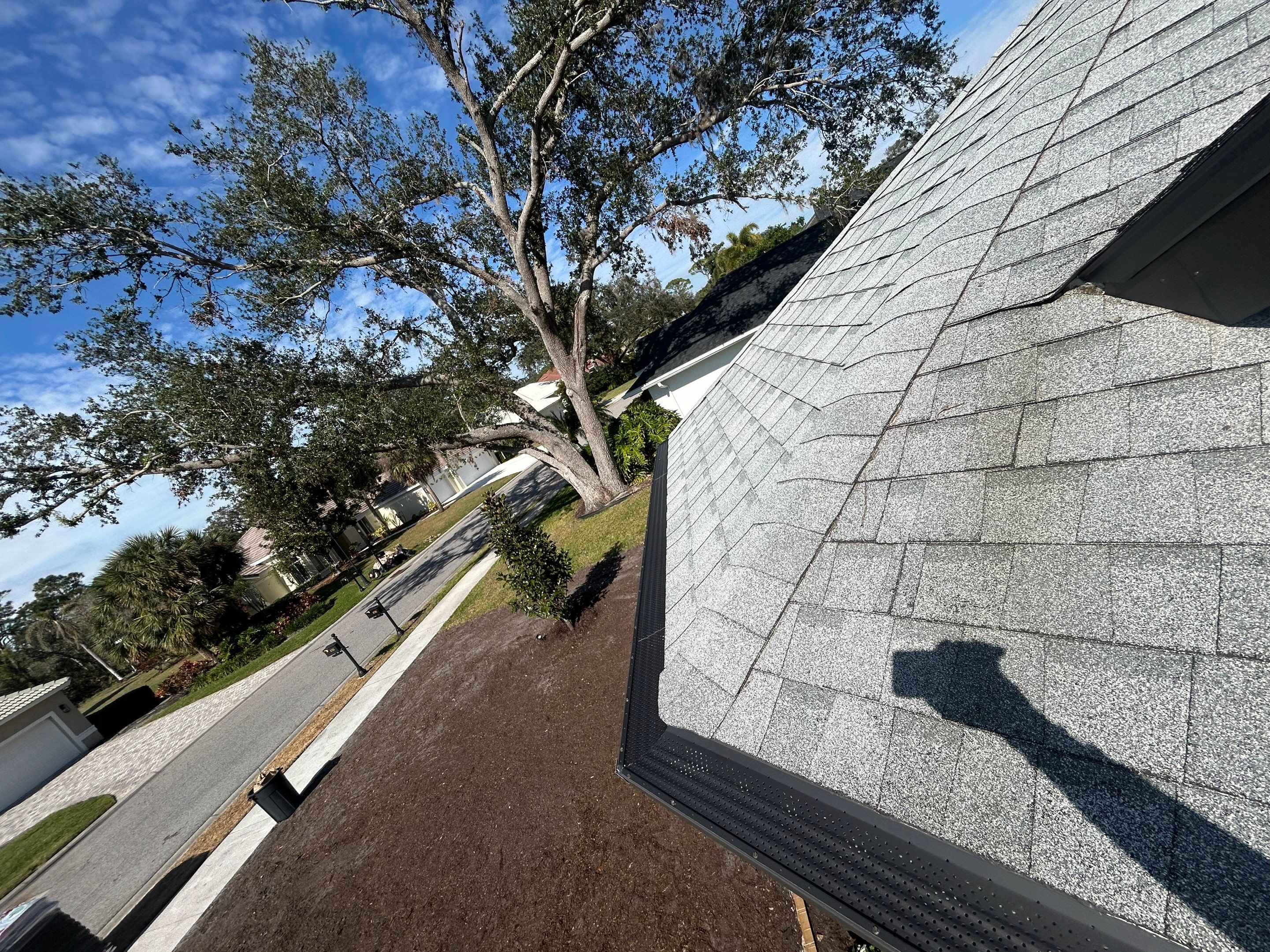 Black Seamless Gutters in Sarasota FL by Gutter Professors