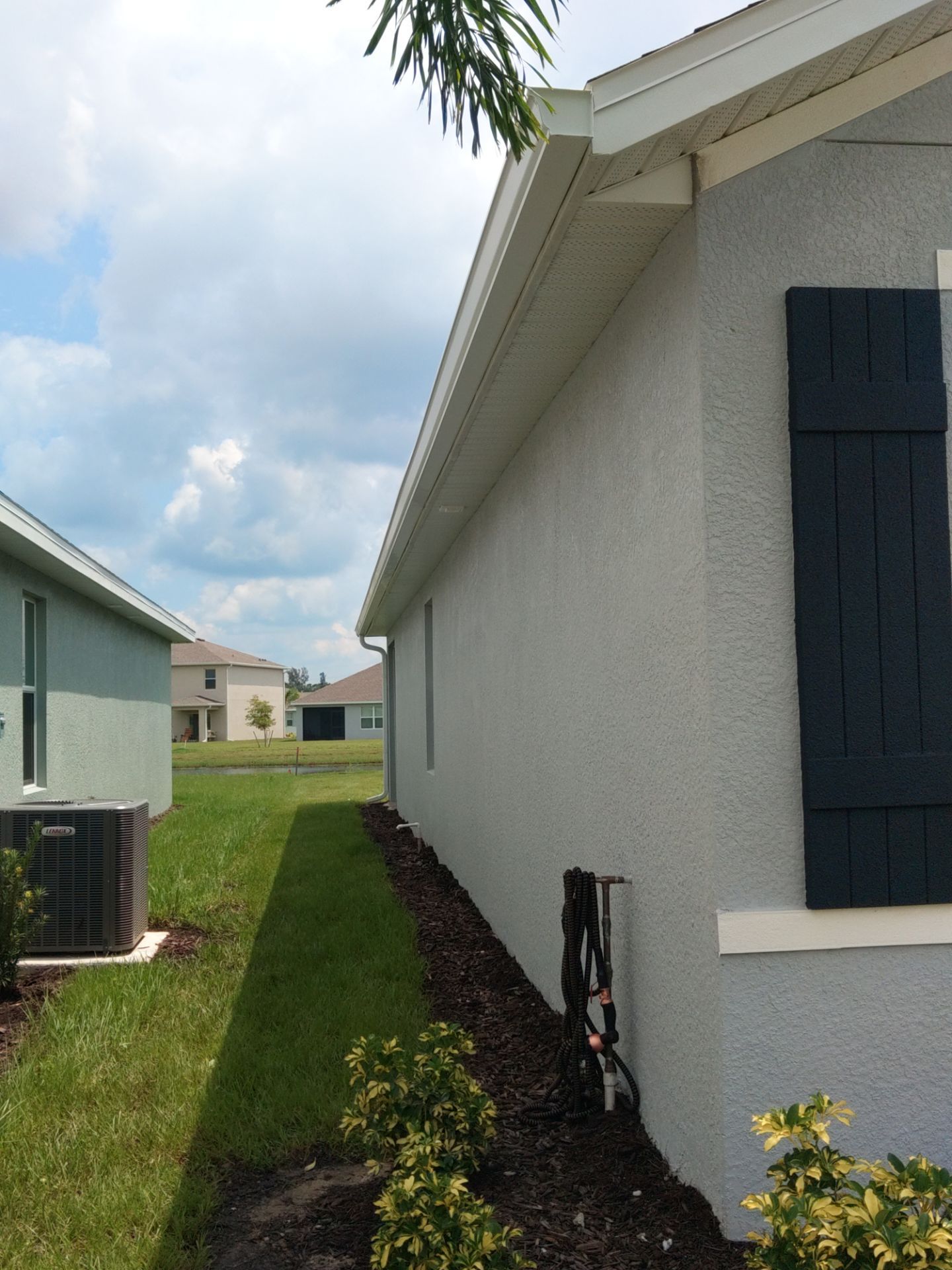 White Seamless Gutters for Beachfront Homes  by Gutter Professors