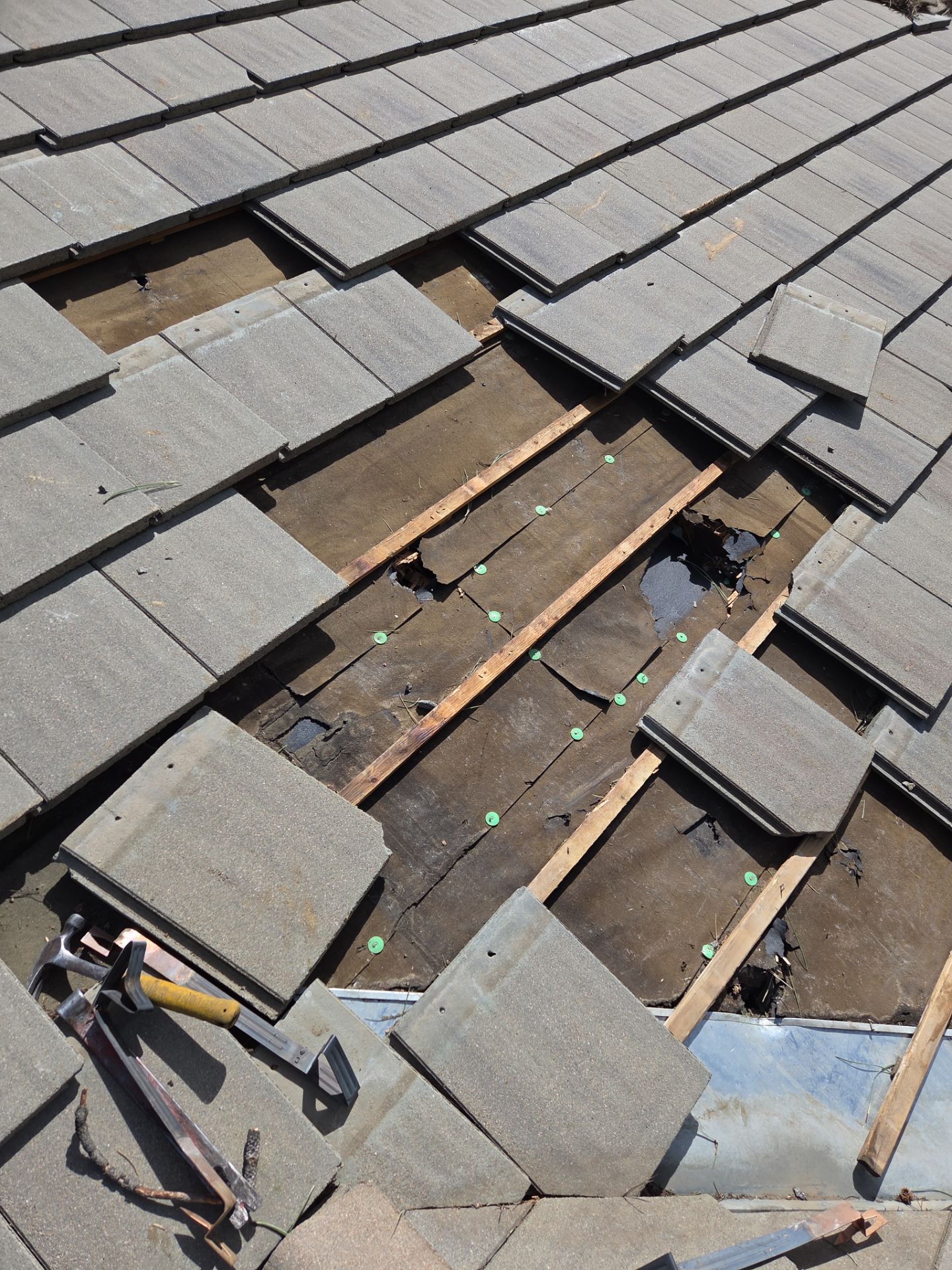 Tile Repair & New Gutters by RTP Roofing Company