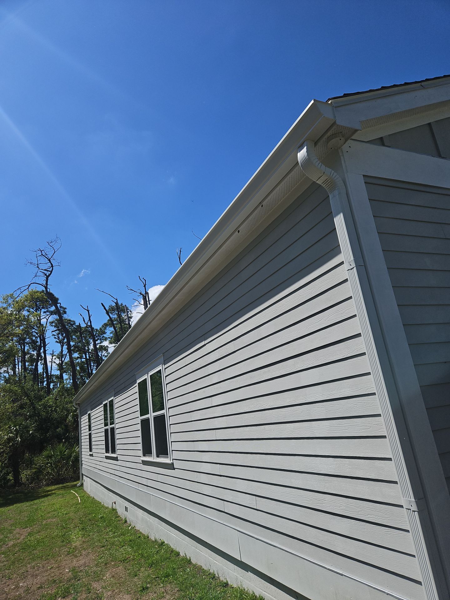 Downspout Installation using 3X4 Elbow Downspout in Port Charlotte FL by Gutter Professors
