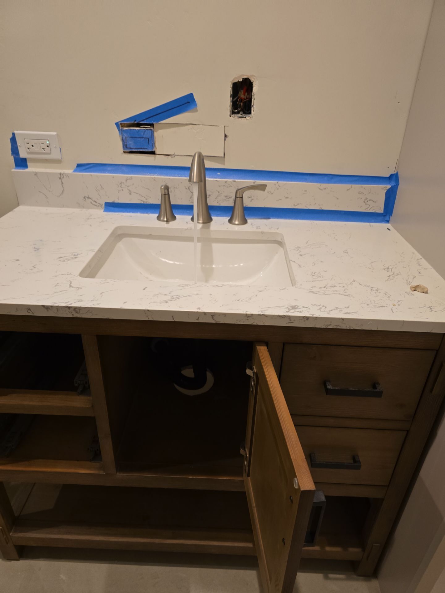 Installation of New Sink Flange, Piping, Fixtures, and Water Heater by Us Plumbing 