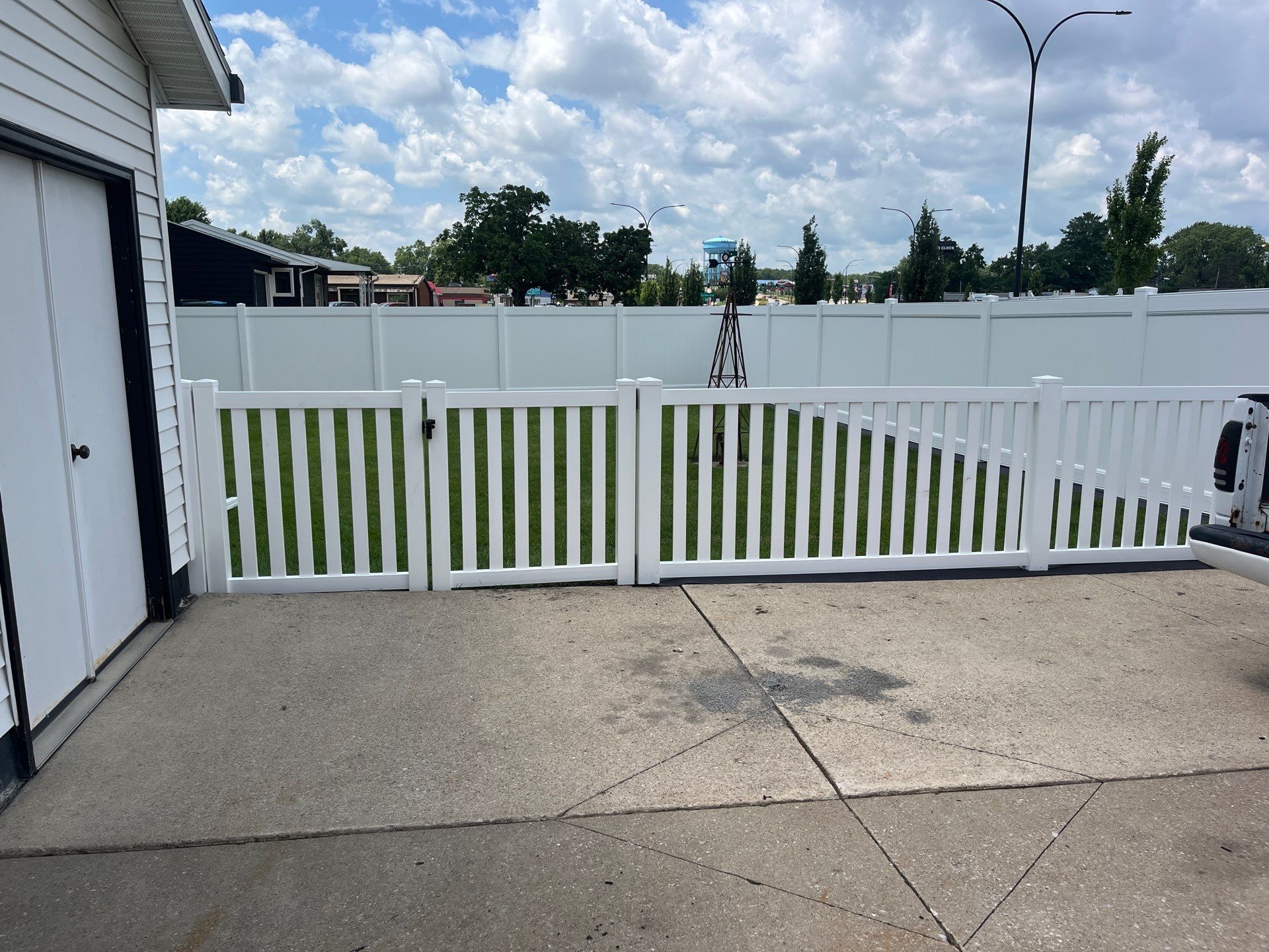 White Vinyl Privacy and Picket Fence Installation in Waterloo by Perfect Picket Fence and Stain