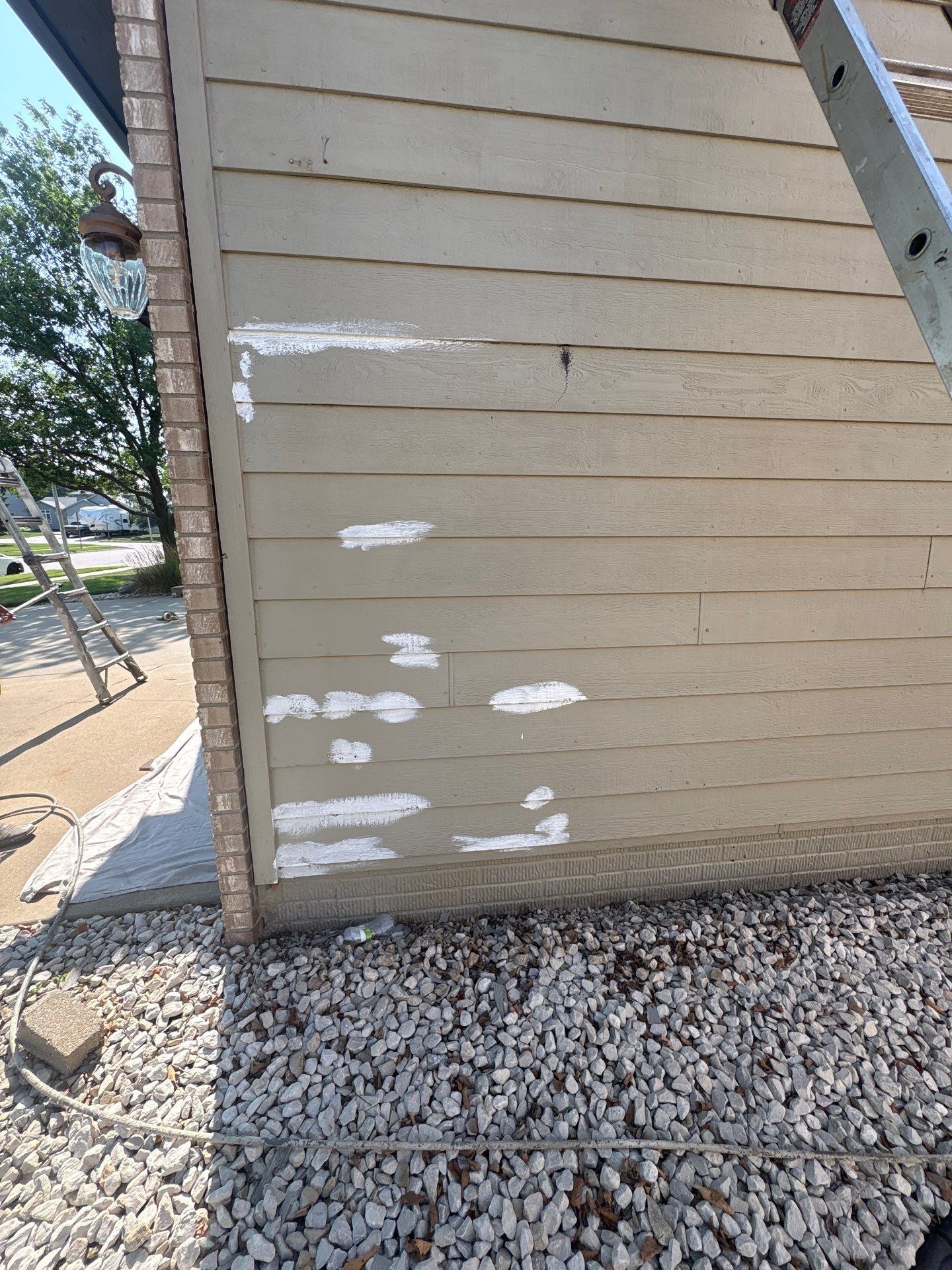 Residential Exterior Painting and Siding Refresh in Sioux Falls by Select Painting, Coatings & Garage Cabinets