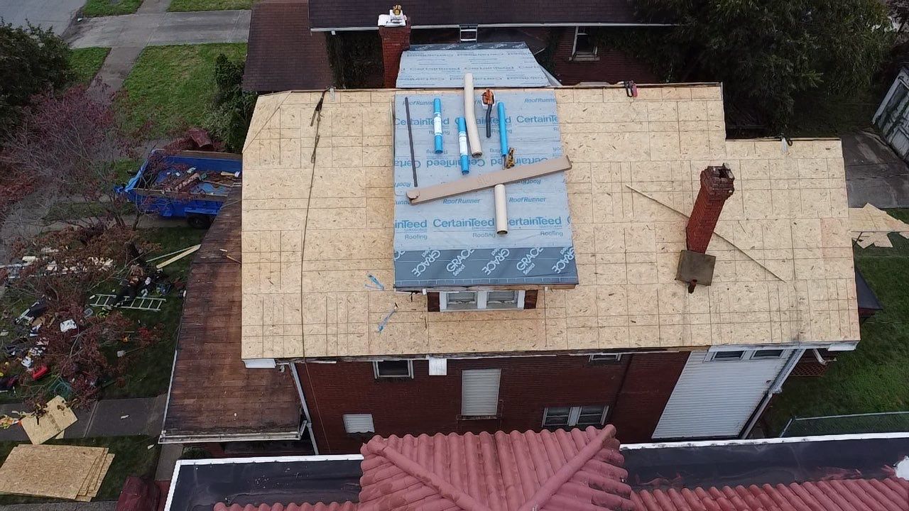 Adkins Project  by Fahey Roofing + Contracting