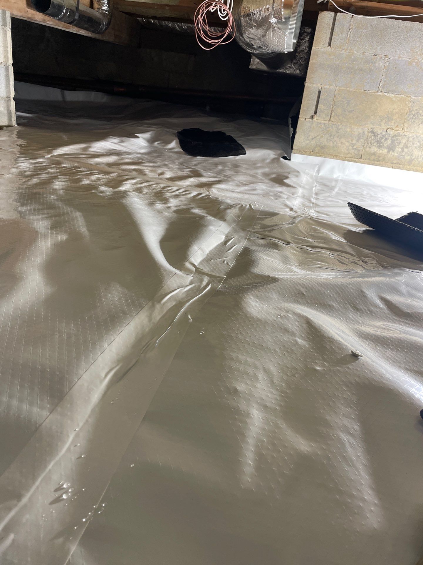Basement Exterior Walls using Closed Cell Spray Foam by NYS Foam & Energy
