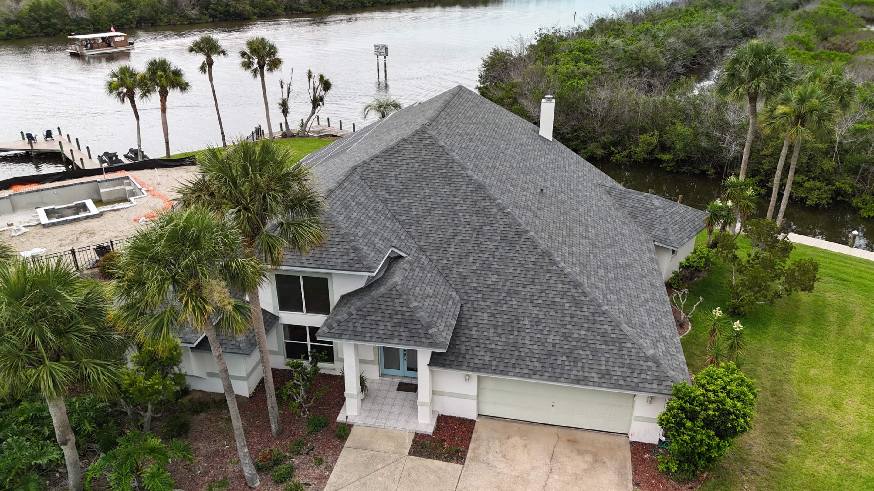 Tamko Titan Roof Replacement with Decking Repairs in Merritt Island by Wiedmann Construction & Roofing