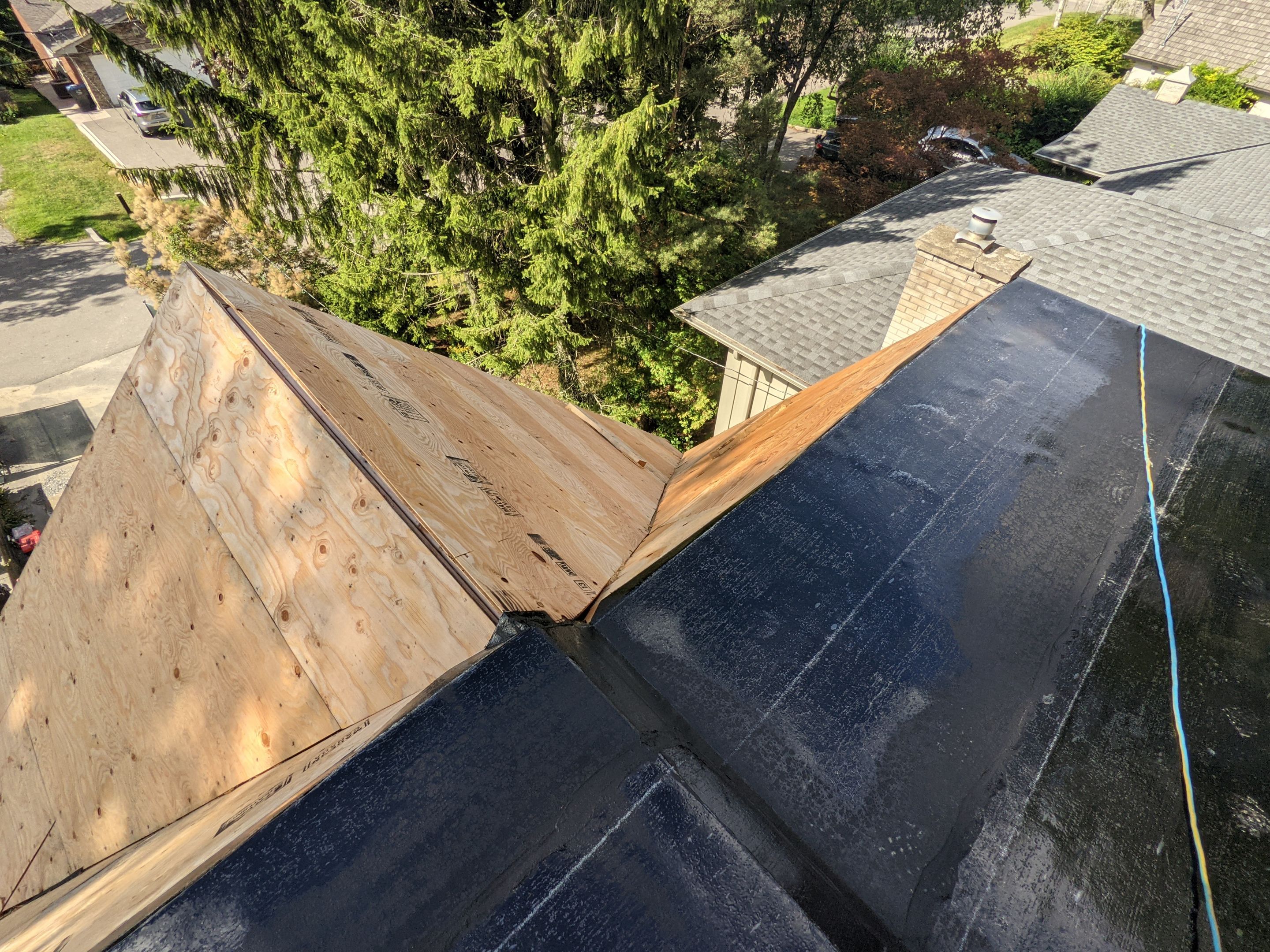 New Roof Installation using 16" Standing Seam Panels by Jay Carter Roofing & Sheet Metal