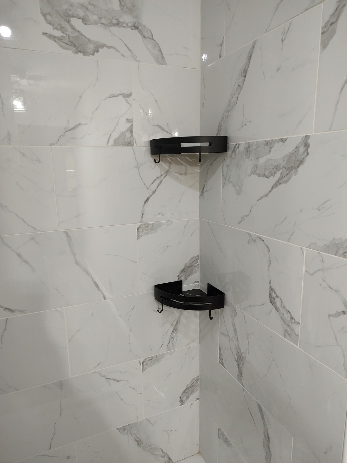 Bathroom remodel w/shower upgrade by In & Out Construction & Remodeling, LLC