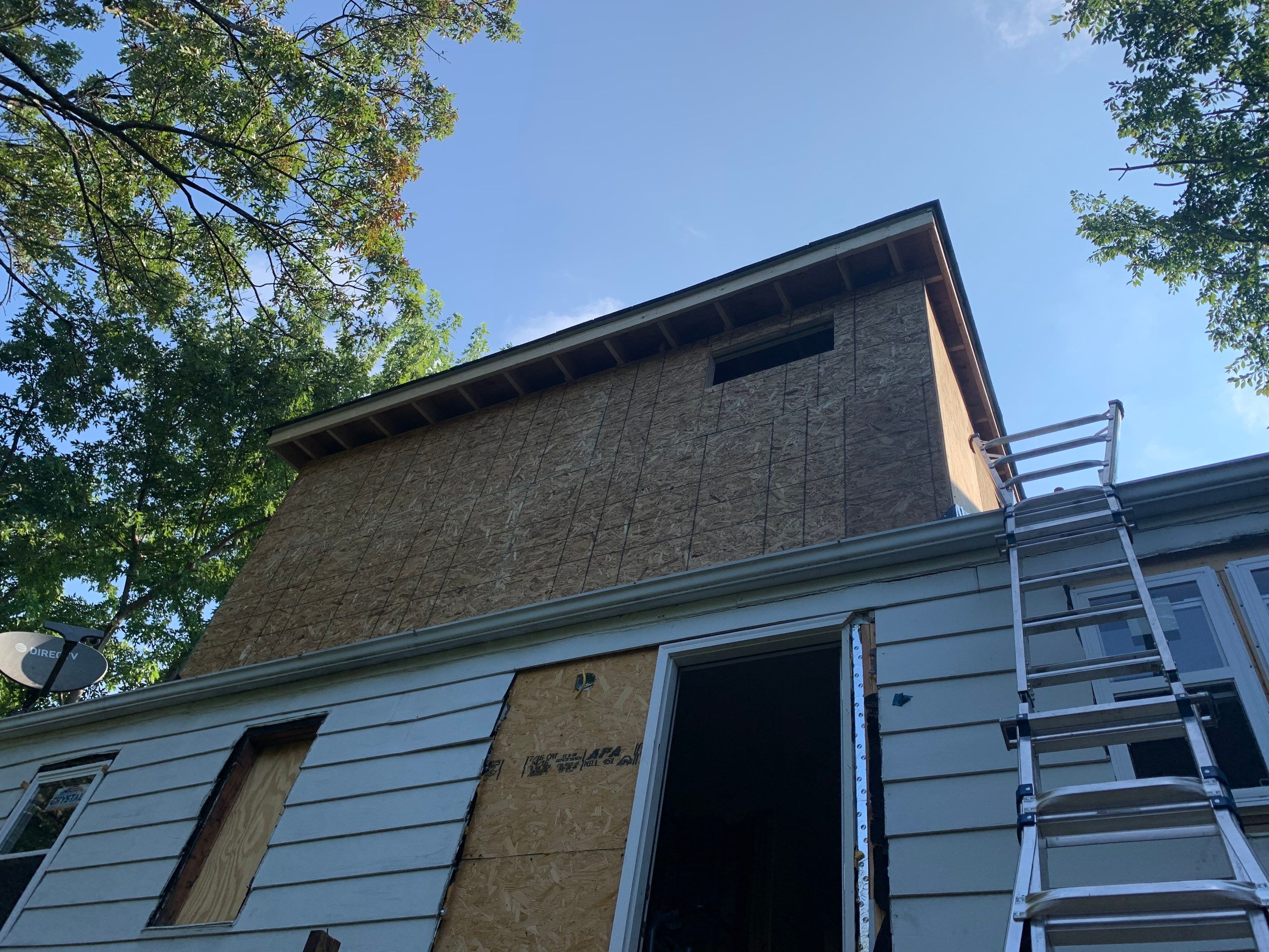 Room addition on the second floor of house by Greenspring Construction Services