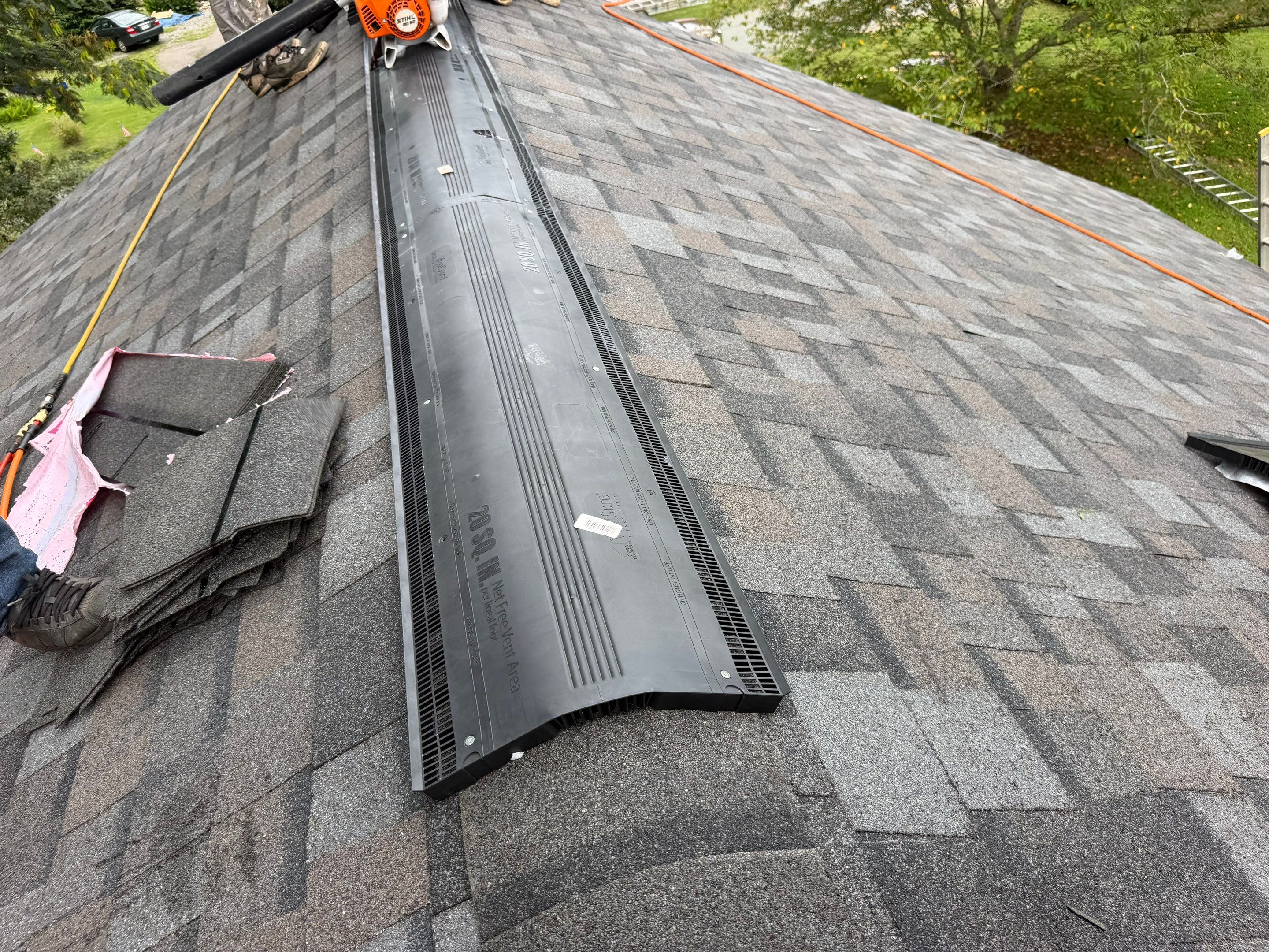 Asphalt Shingle Roof Replacement and Custom Porch Renovation in Hayes by Cade Construction