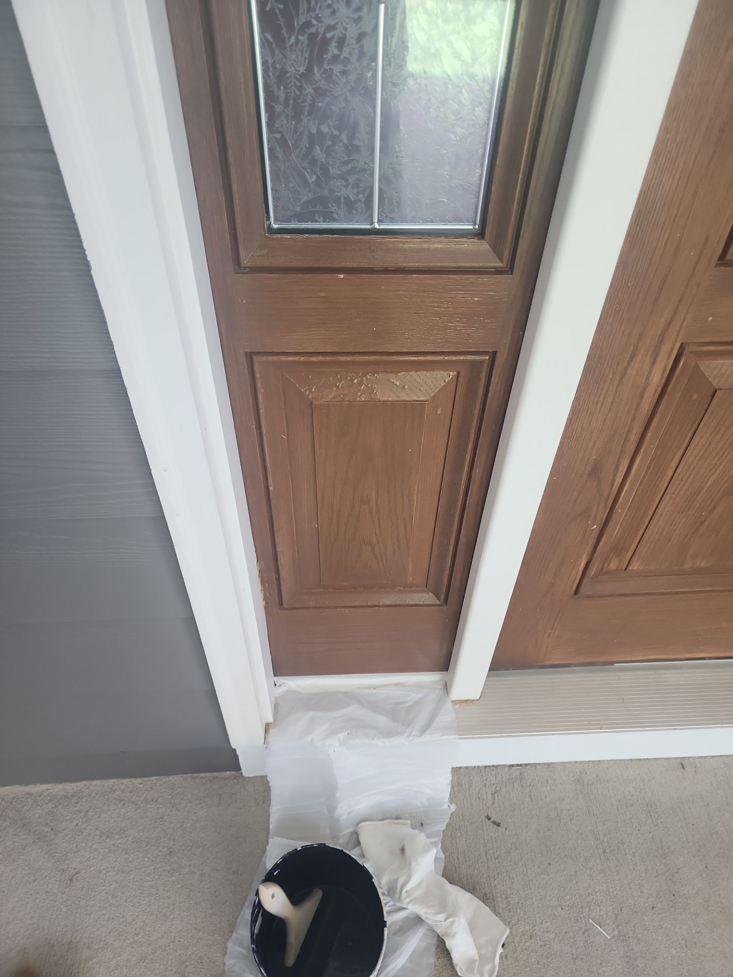 Siding replacement, exterior painting, and front door staining. by GonzalezPainters & Contractors Inc