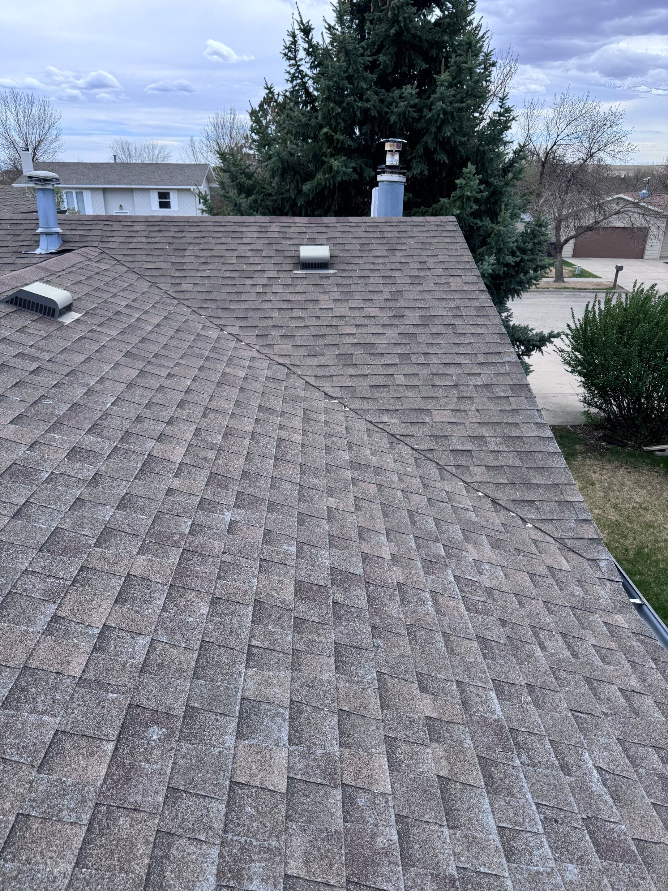 Full Architectural Shingle Roof Replacement and Gutter Installation in Rapid City by Weather-Tite Exteriors LLC
