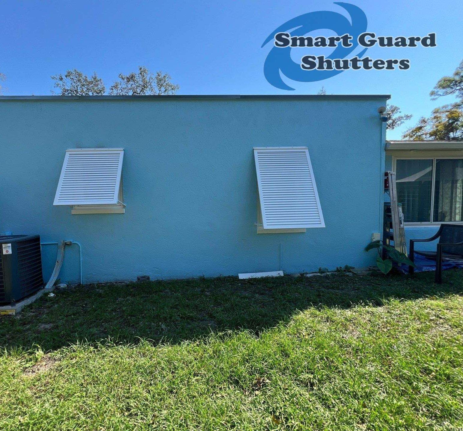 Decorative Bahama Shutters in Signal White  by Smart Guard Shutters